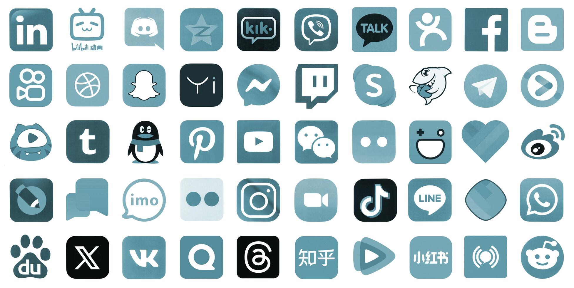 KYIV, UKRAINE - APRIL 1, 2024 Many icons of social media, messengers, sharing platforms photo