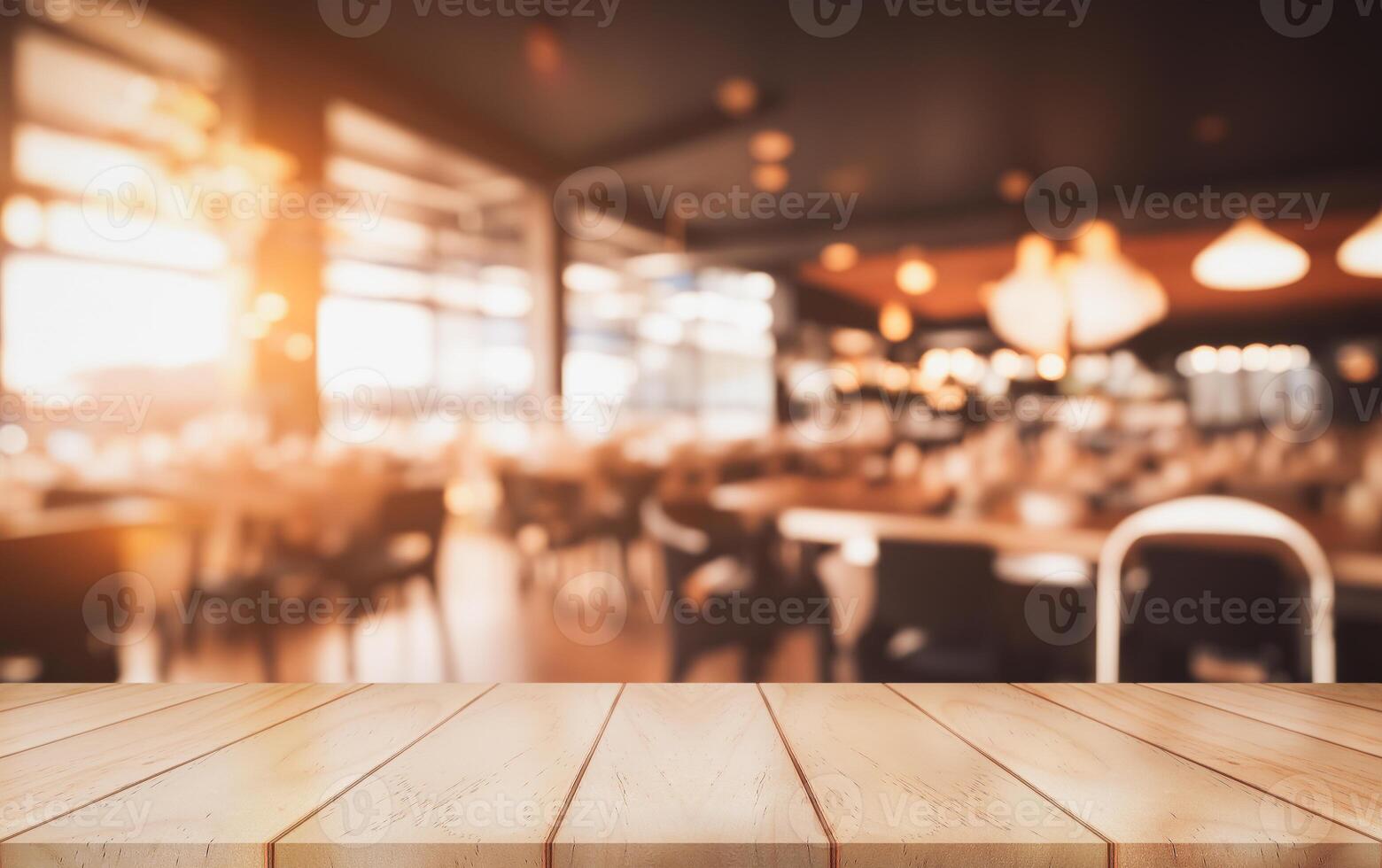 Empty wooden table top with lights bokeh on blur restaurant background. photo