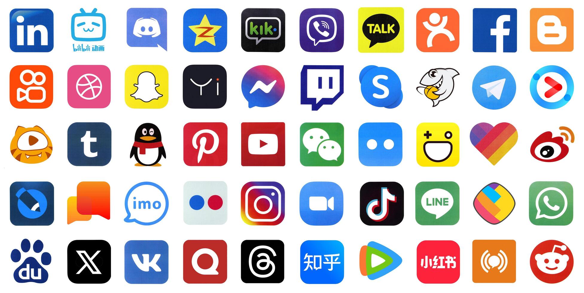 KYIV, UKRAINE - APRIL 1, 2024 Many icons of social media, messengers, sharing platforms photo