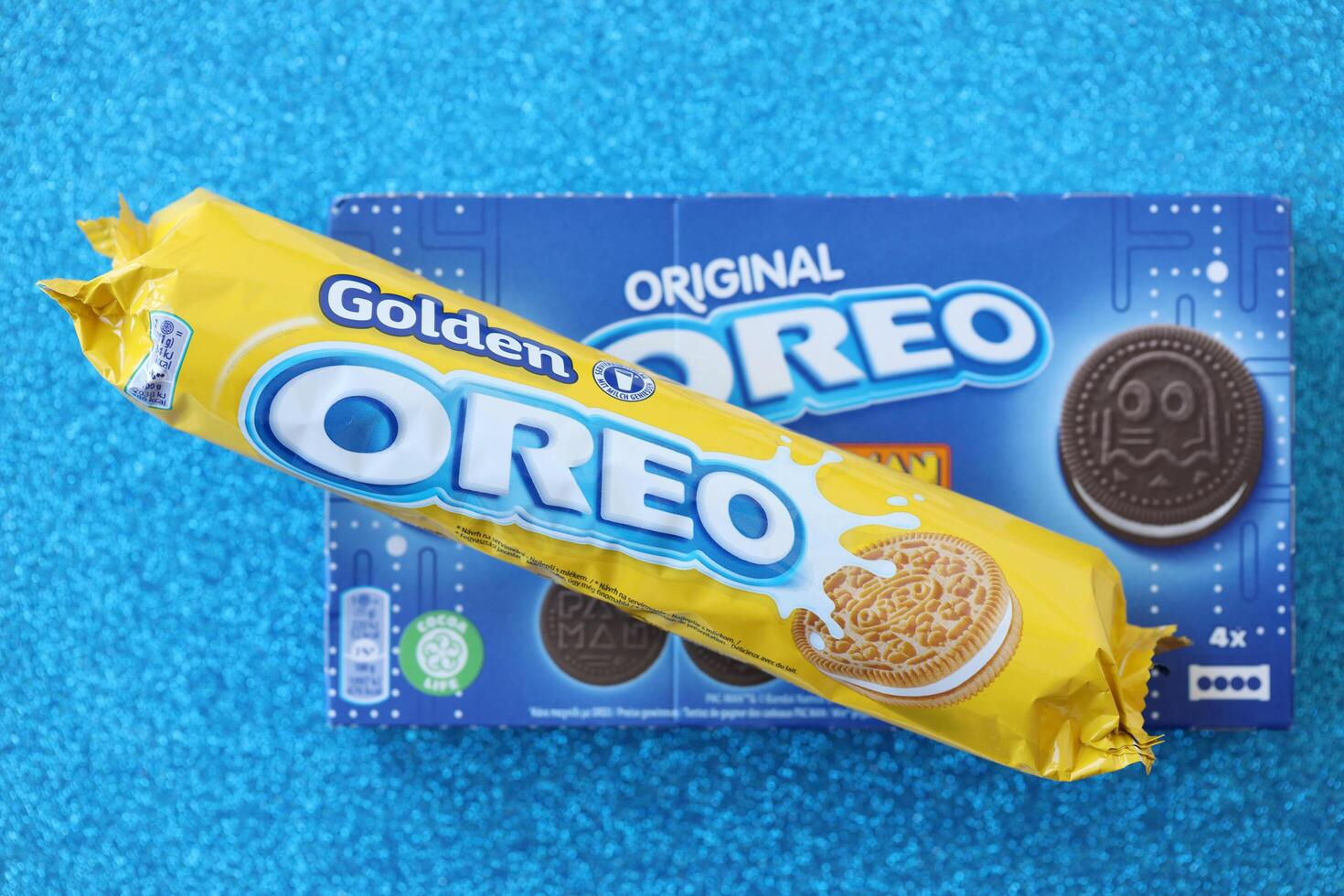 KYIV, UKRAINE - APRIL 20, 2024 Oreo Golden and pac-man crispy cookies packs. The brand Oreo owned by american company Mondelez international photo