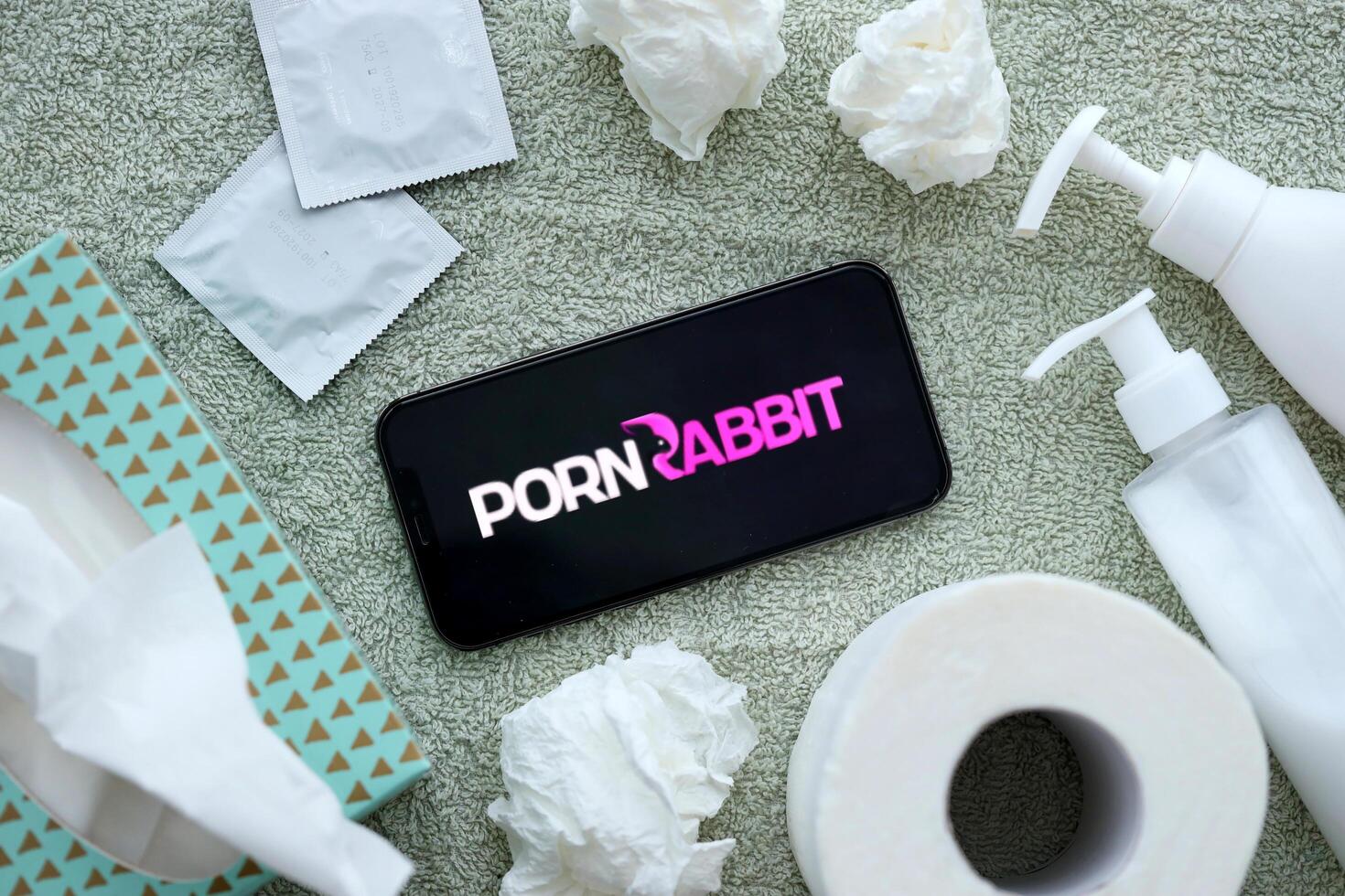 KYIV, UKRAINE - JANUARY 23, 2024 PornRabbit adult content website logo on display of iPhone 12 Pro photo