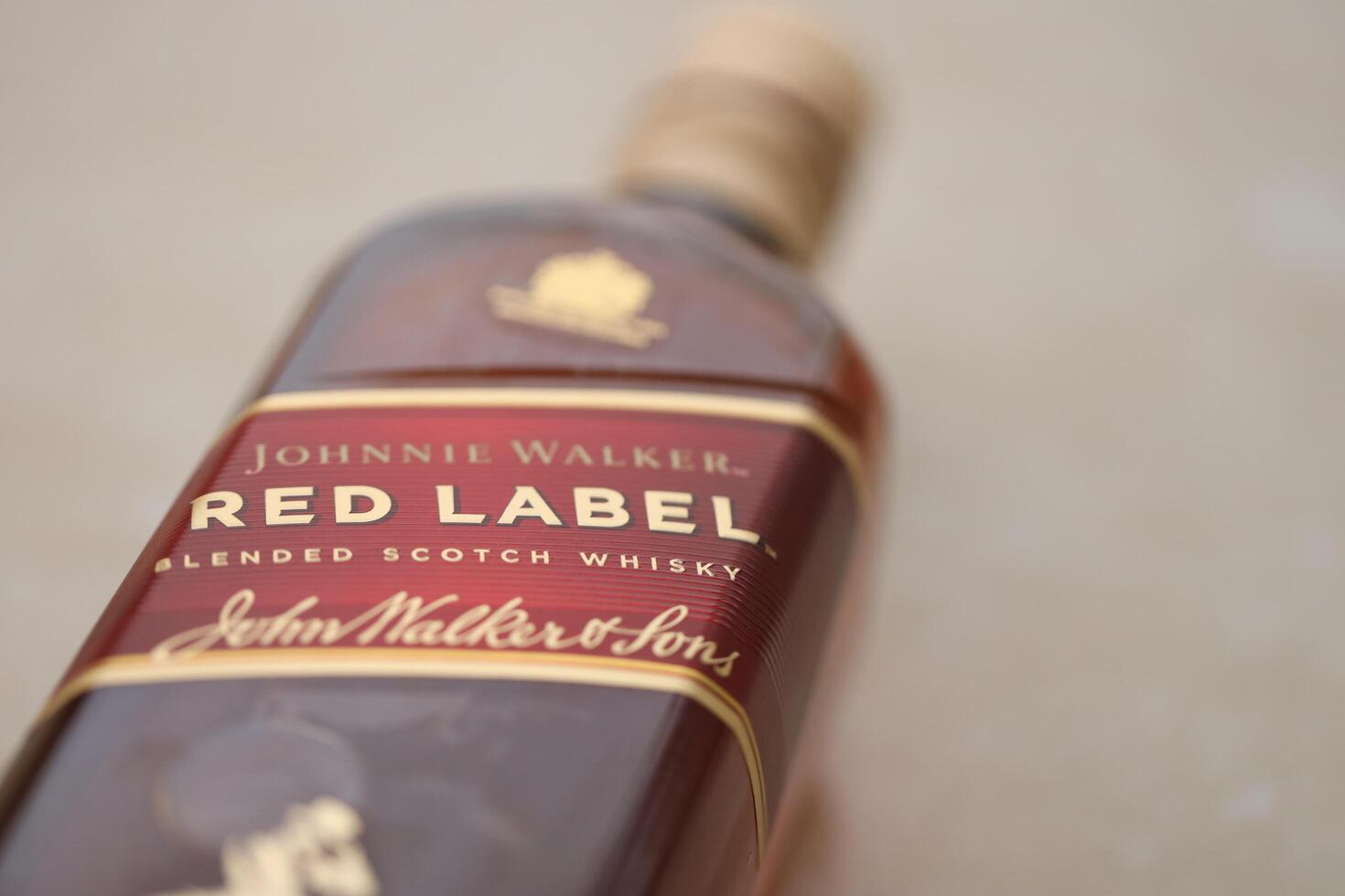 KYIV, UKRAINE - NOVEMBER 27, 2023 Johnnie Walker red label scotch whisky bottle photo