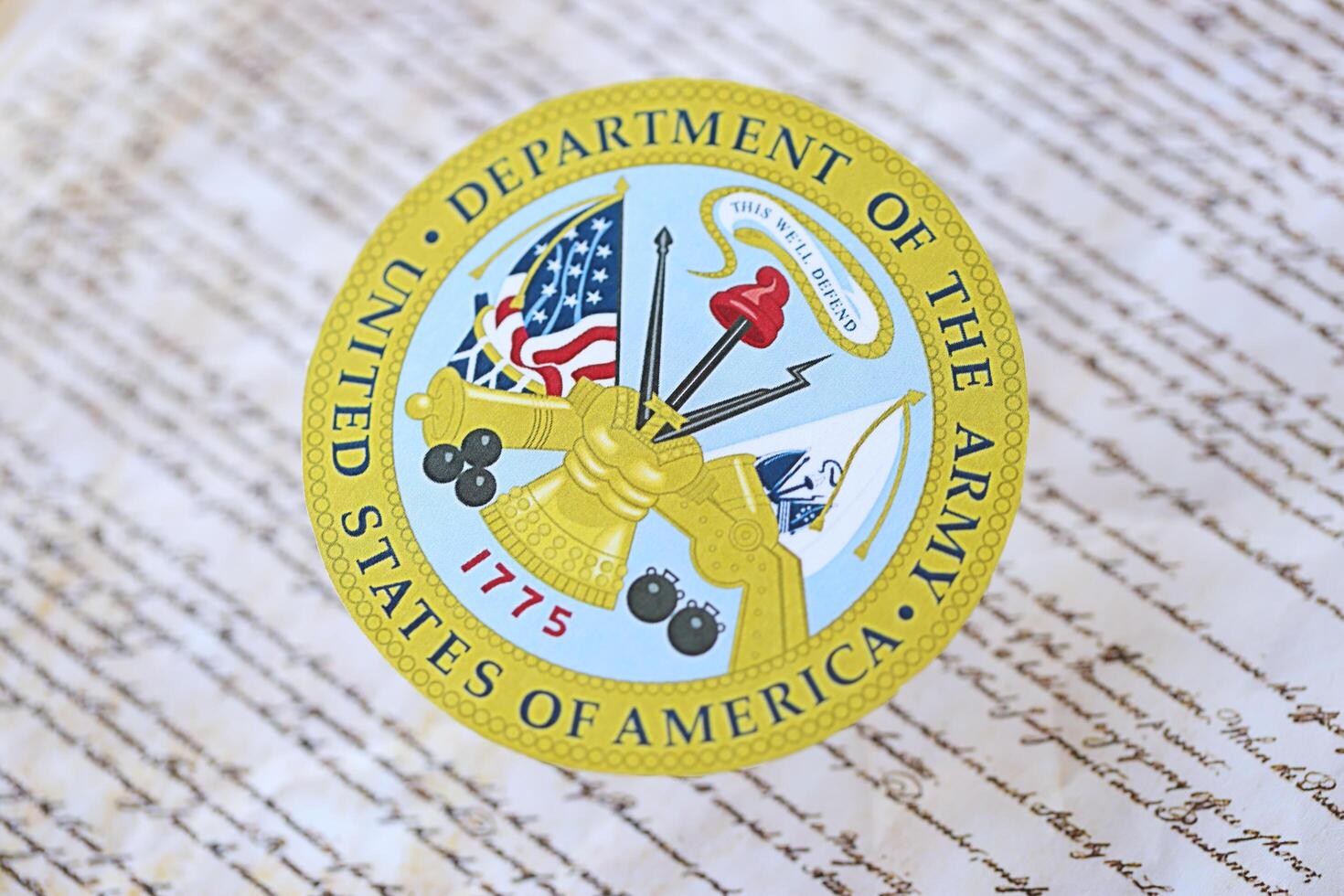 KYIV, UKRAINE - MARCH 9, 2024 US Department of Army seal on United States Constitution photo