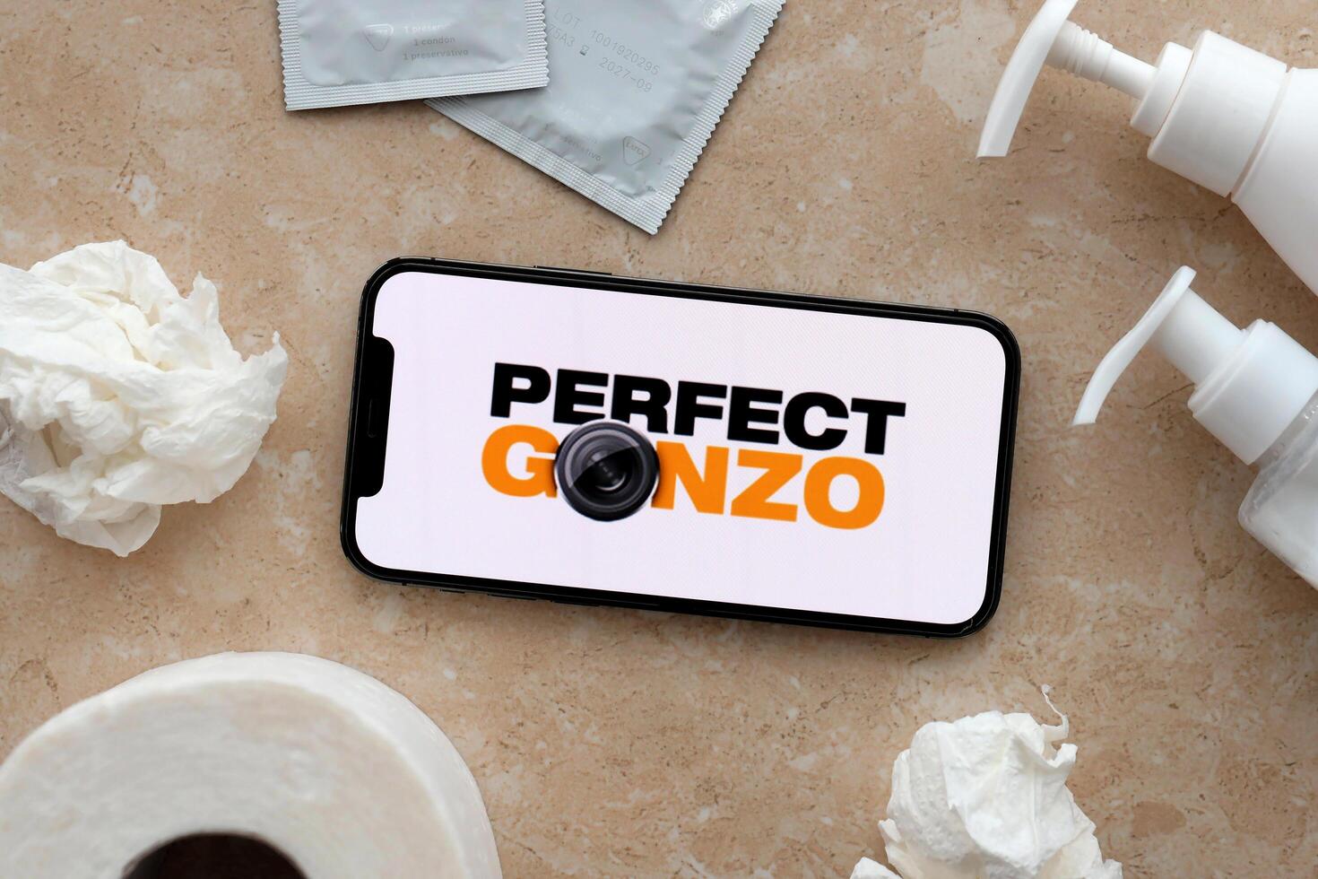 KYIV, UKRAINE - JANUARY 23, 2024 PerfectGonzo adult content website logo on display of iPhone 12 Pro photo