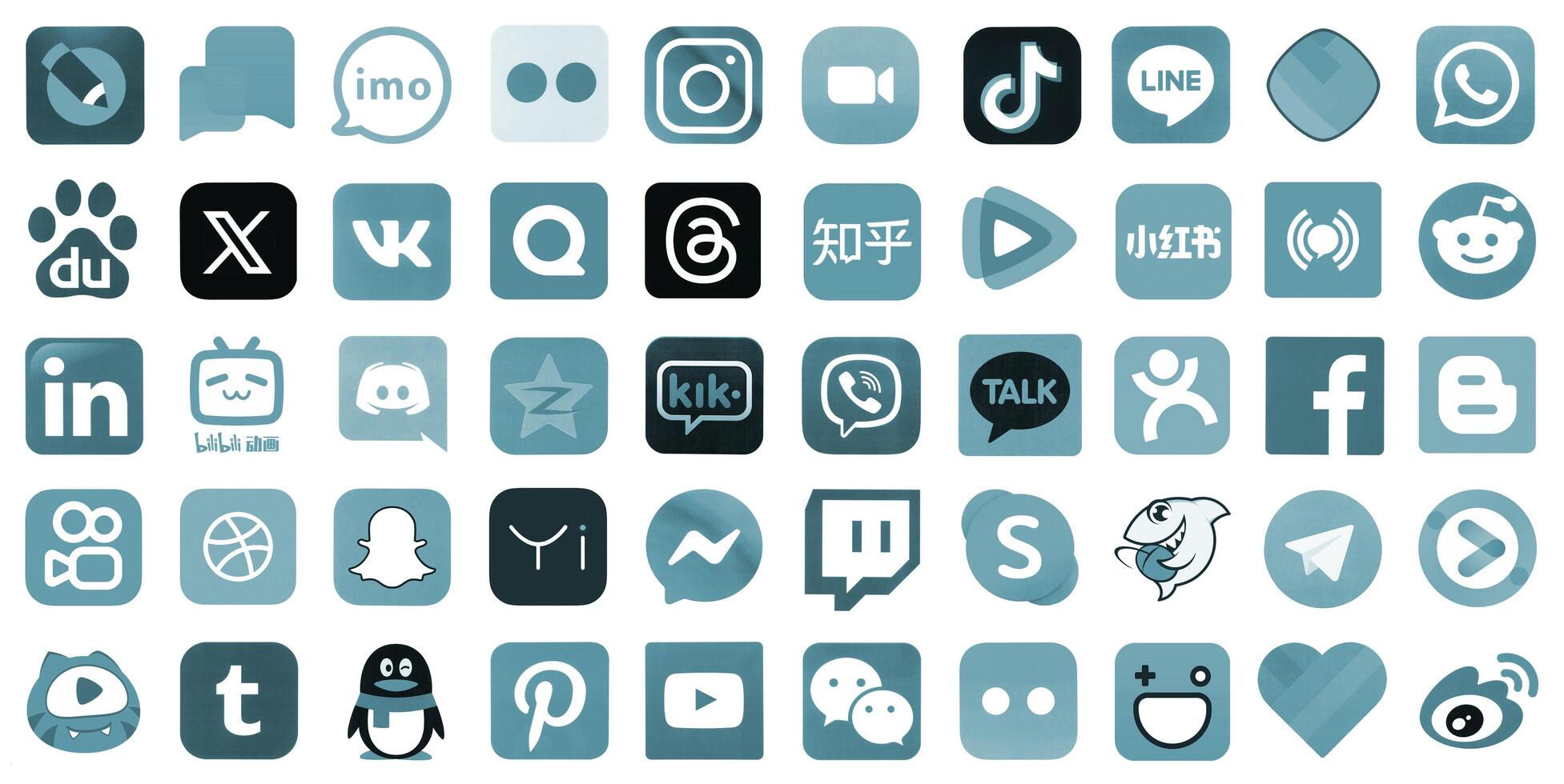 KYIV, UKRAINE - APRIL 1, 2024 Many icons of social media, messengers, sharing platforms photo
