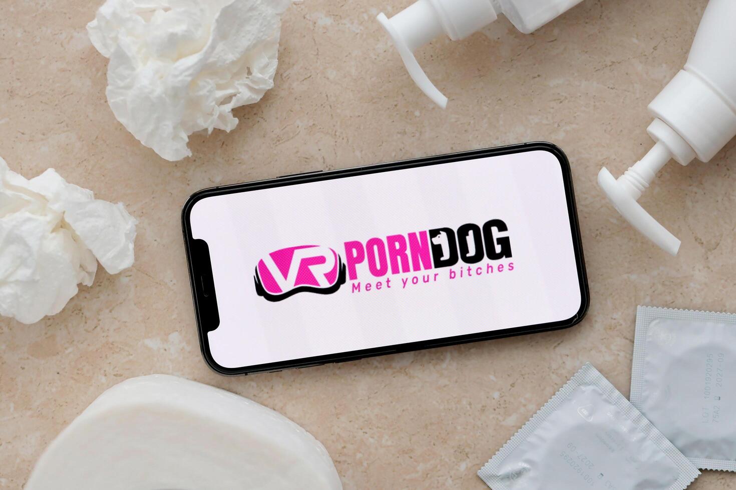 KYIV, UKRAINE - JANUARY 23, 2024 VRPornDog adult content website logo on display of iPhone 12 Pro photo
