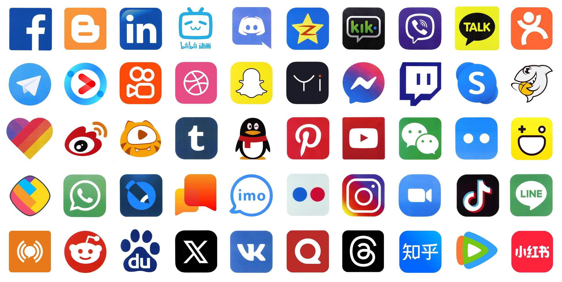 KYIV, UKRAINE - APRIL 1, 2024 Many icons of social media, messengers, sharing platforms photo