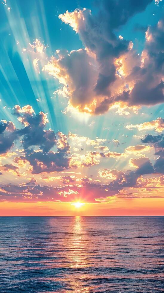 Colorful sunset sky with beautiful cloud over the ocean photo