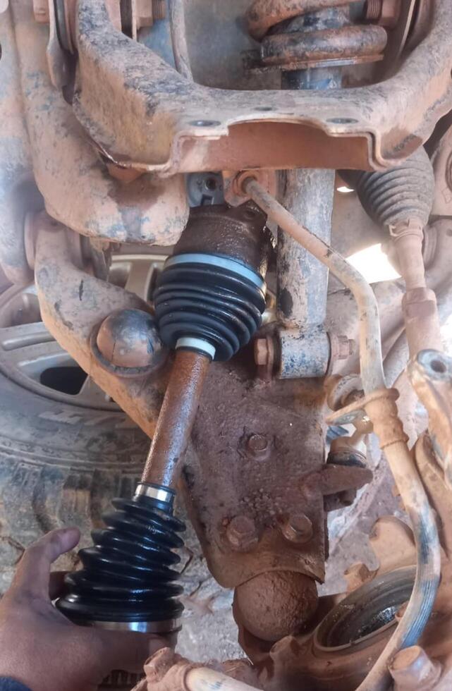 broken car spare part in the workshop photo
