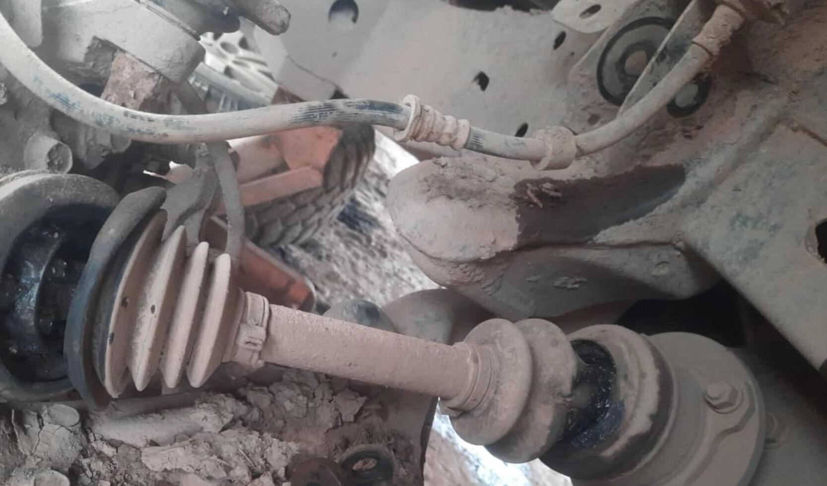broken car spare part in the workshop photo