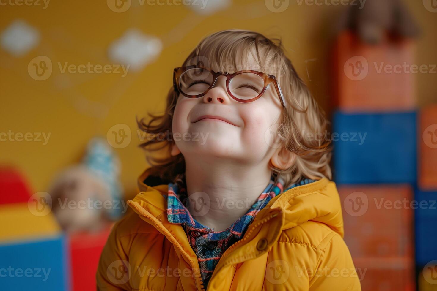 Happy child plays educational game photo