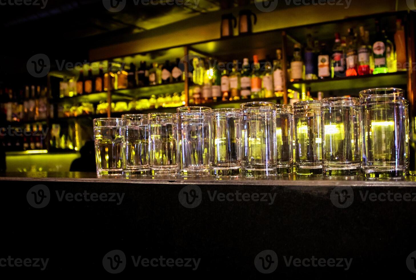 Empty glasses on the counter in bar, club. photo