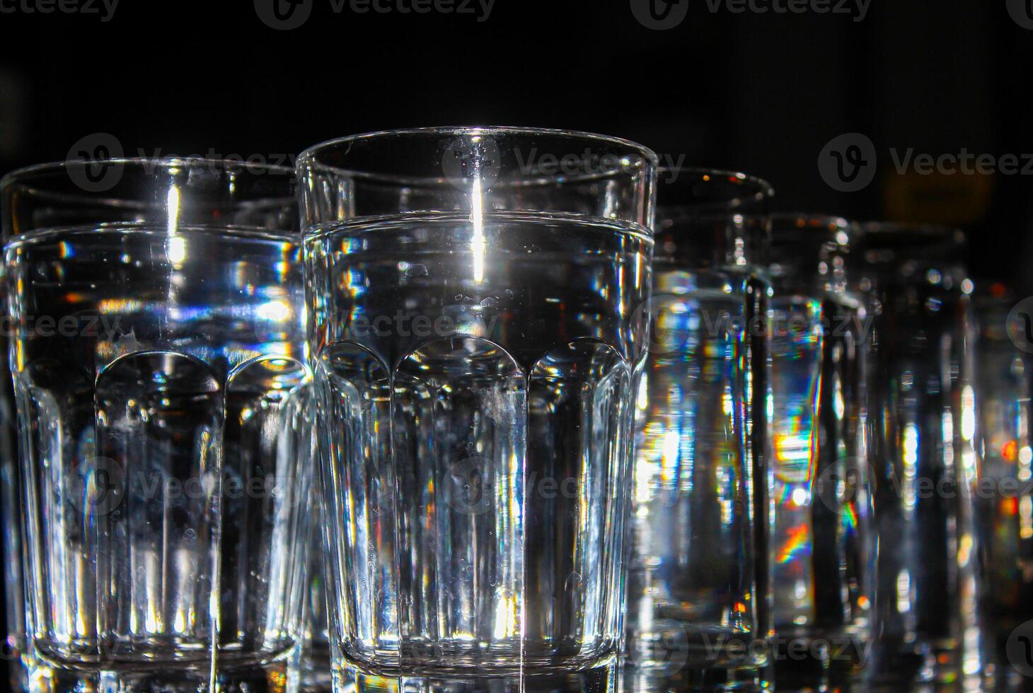 Empty glasses on the counter in bar, club. photo