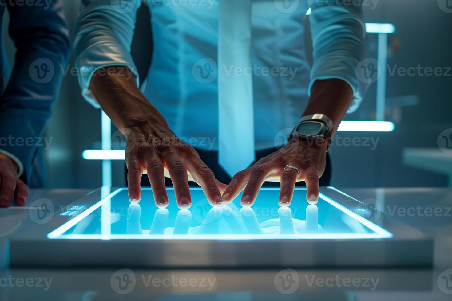 Person interacting with touchscreen display in modern office photo