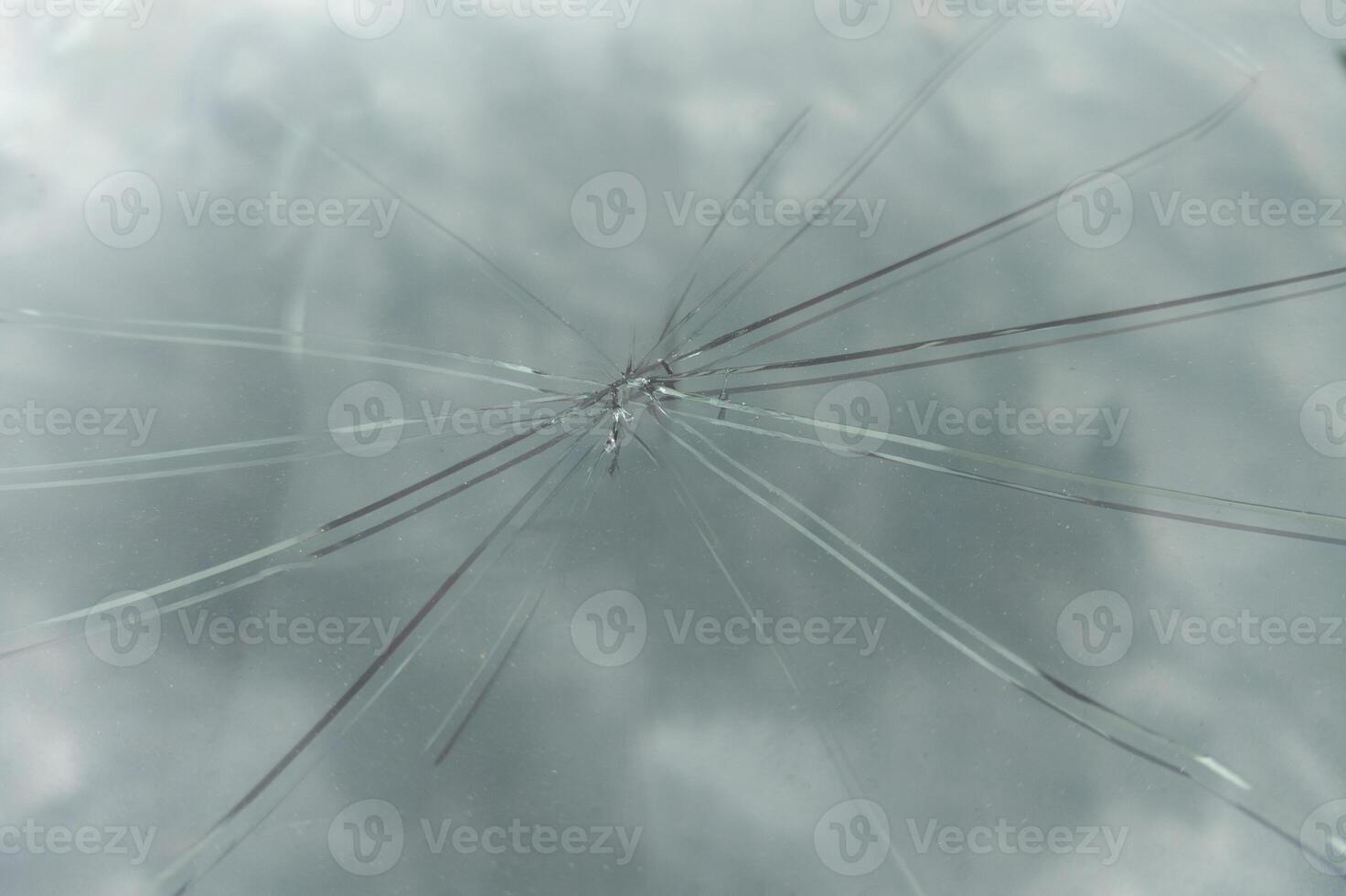 Close-Up of Cracked Car Windshield photo