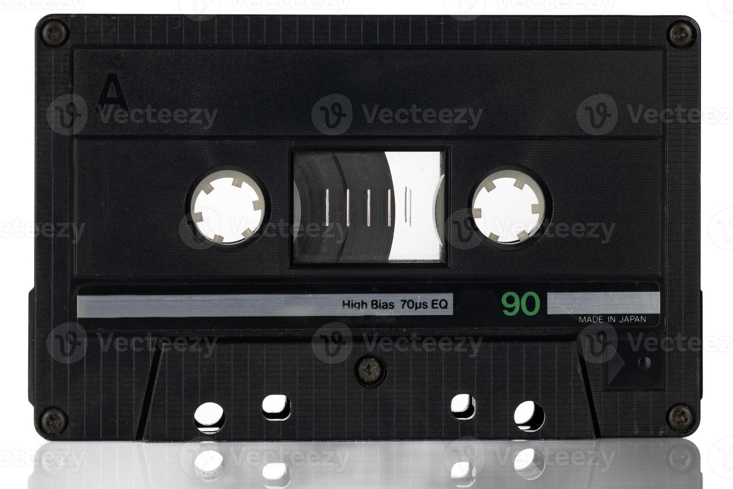 Black Audio Cassette Tape with Green Label. photo