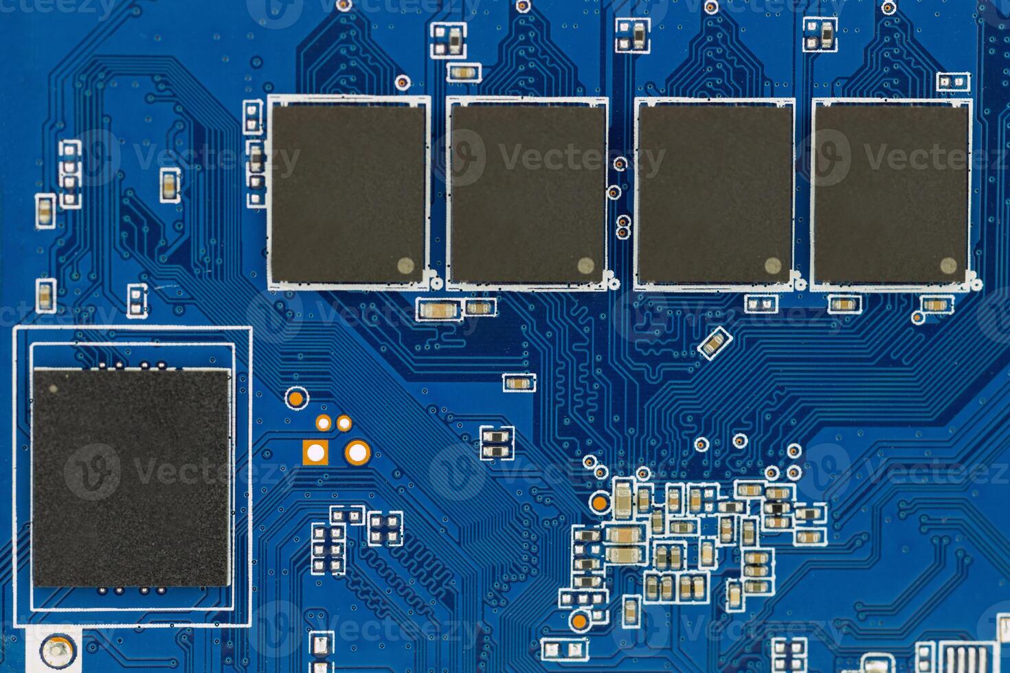 Close-up of Blue Circuit Board Components photo