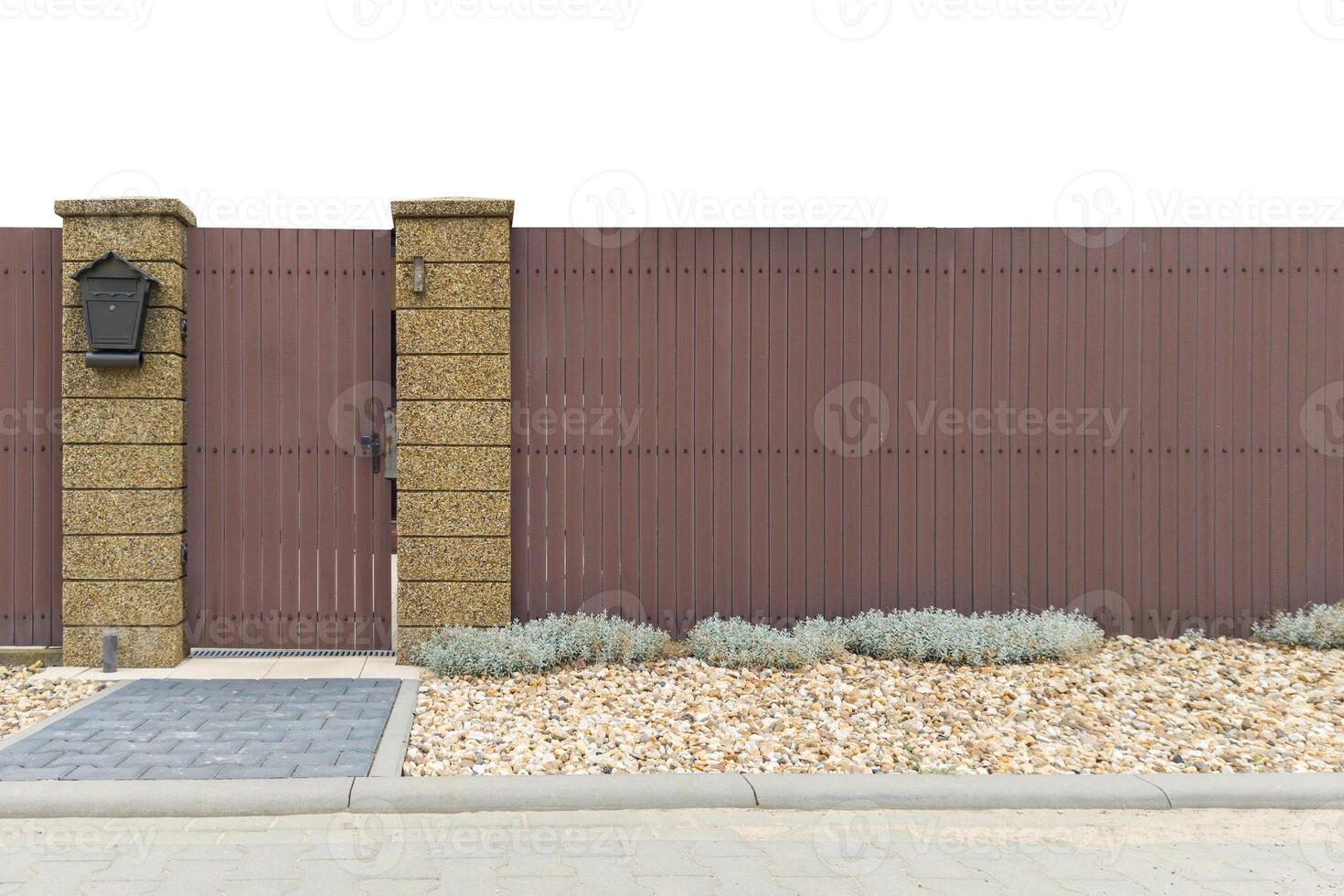 Rustic Brown Gate with Stone Columns photo