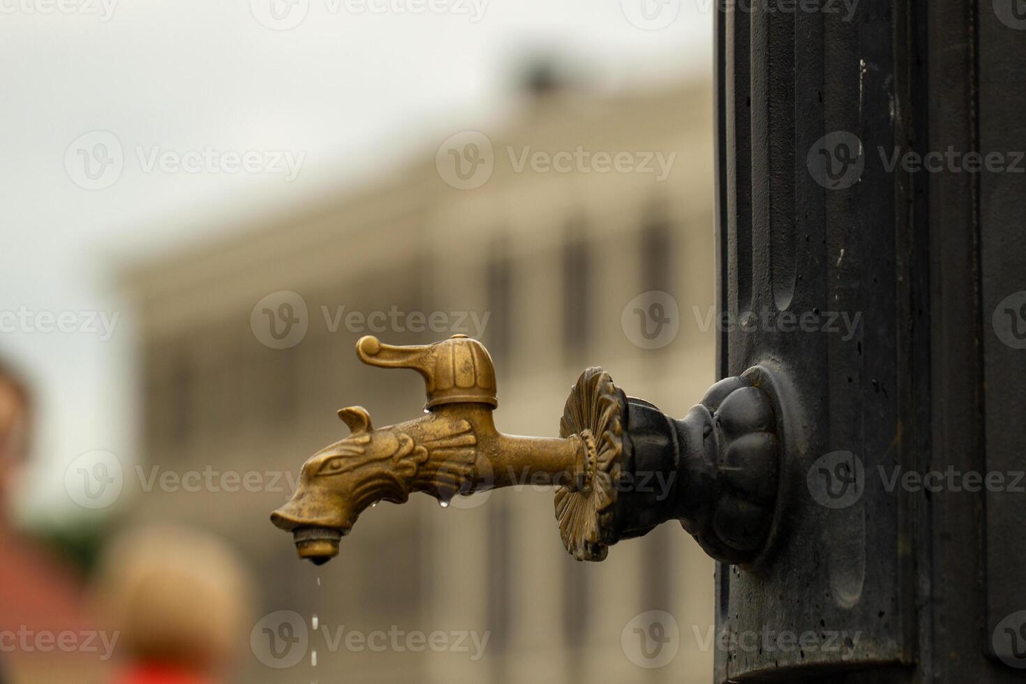 free public drinking water tap, extreme high temperature in the world, coolness, water balance in the body photo