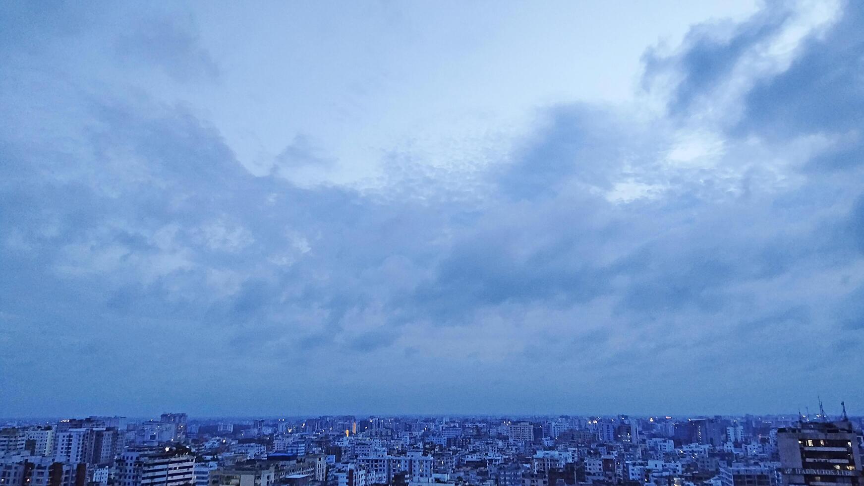 Amazing view of a cityscape with blue sunset Sky photo