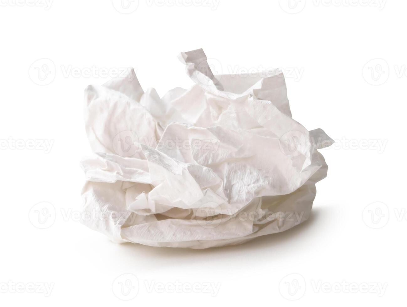 Front view of screwed or crumpled tissue paper balls after use isolated on white background with clipping path photo