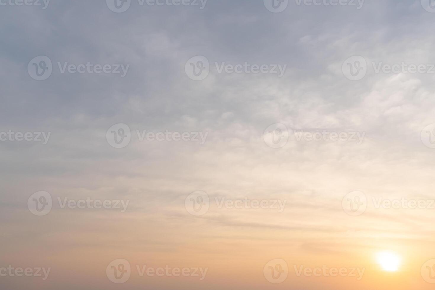 Beautiful morning or evening blue and orange sky taken at the sea while sunset or sunrise used as natural blackground texture in decorative art work. photo