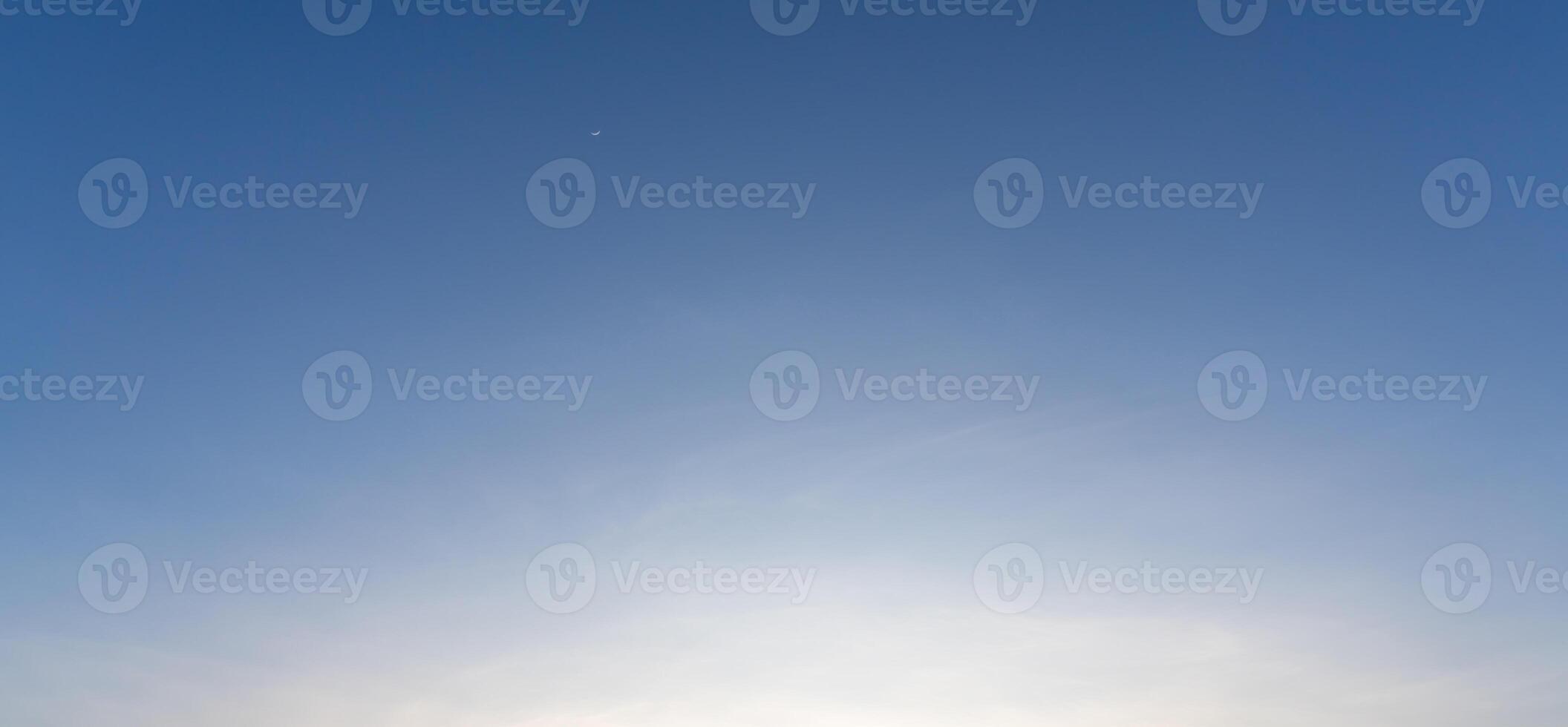 Beautiful morning or evening blue and orange sky taken at the sea used as natural blackground texture photo