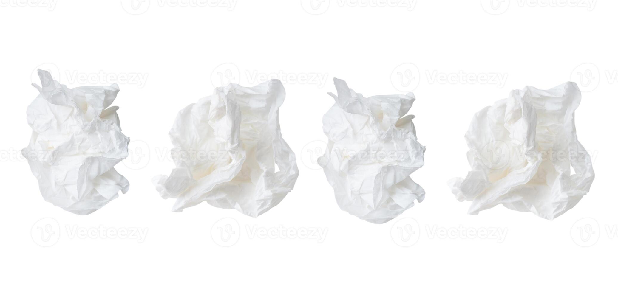 Top view set of crumpled or screwed tissue paper balls isolated on white background with clipping path photo