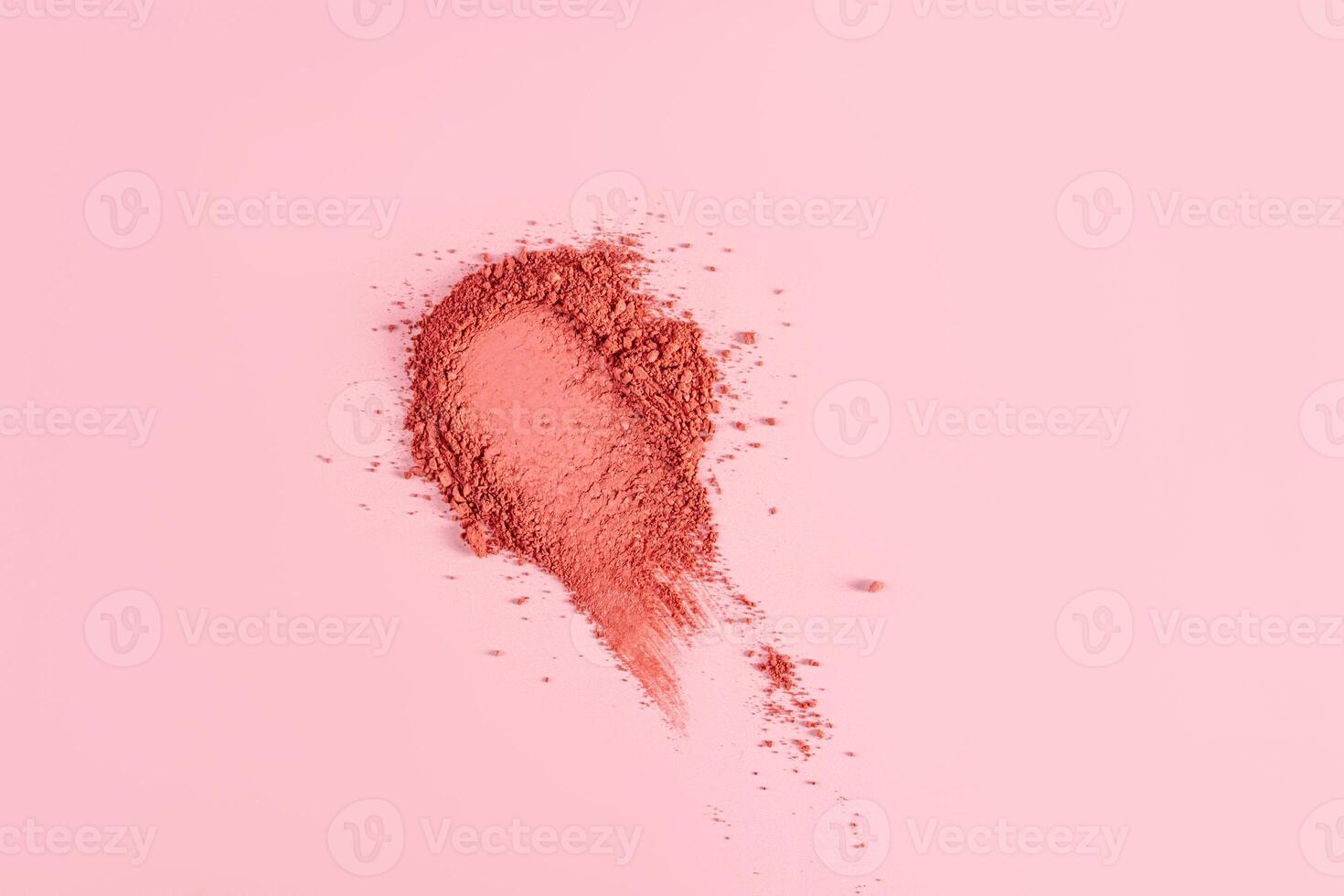 Loose blush swatch for face makeup. Universal tone. Light and delicate powder structure. pink background. A copy space. layout. mockup. photo