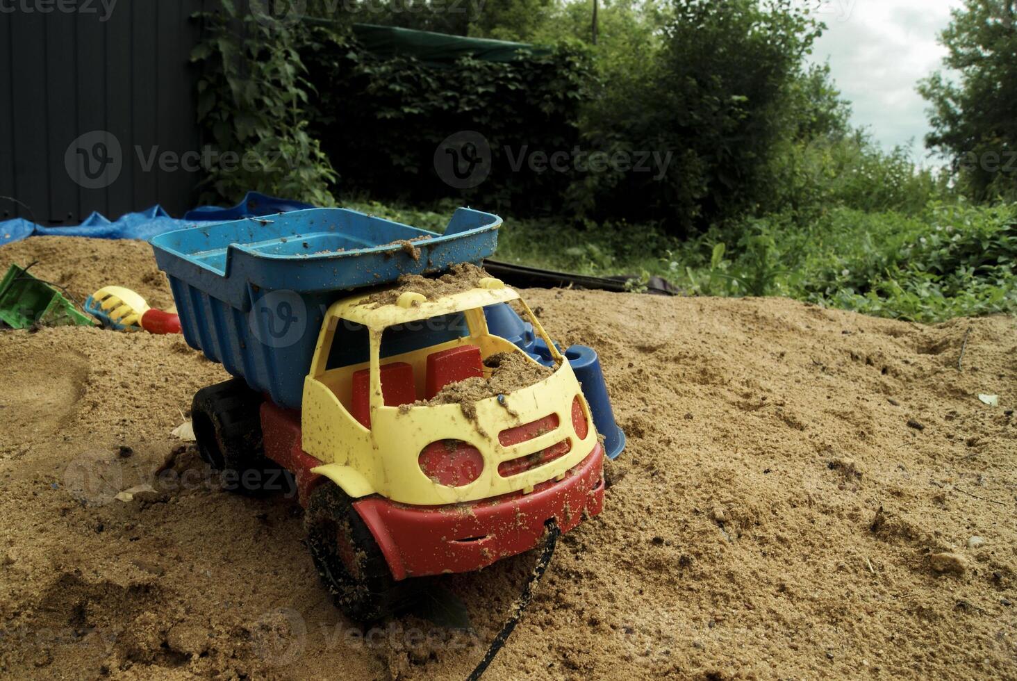 Toy Dump Truck in Sandbox photo