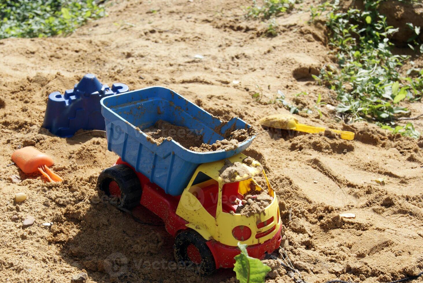 Toy Dump Truck in Sandpit photo