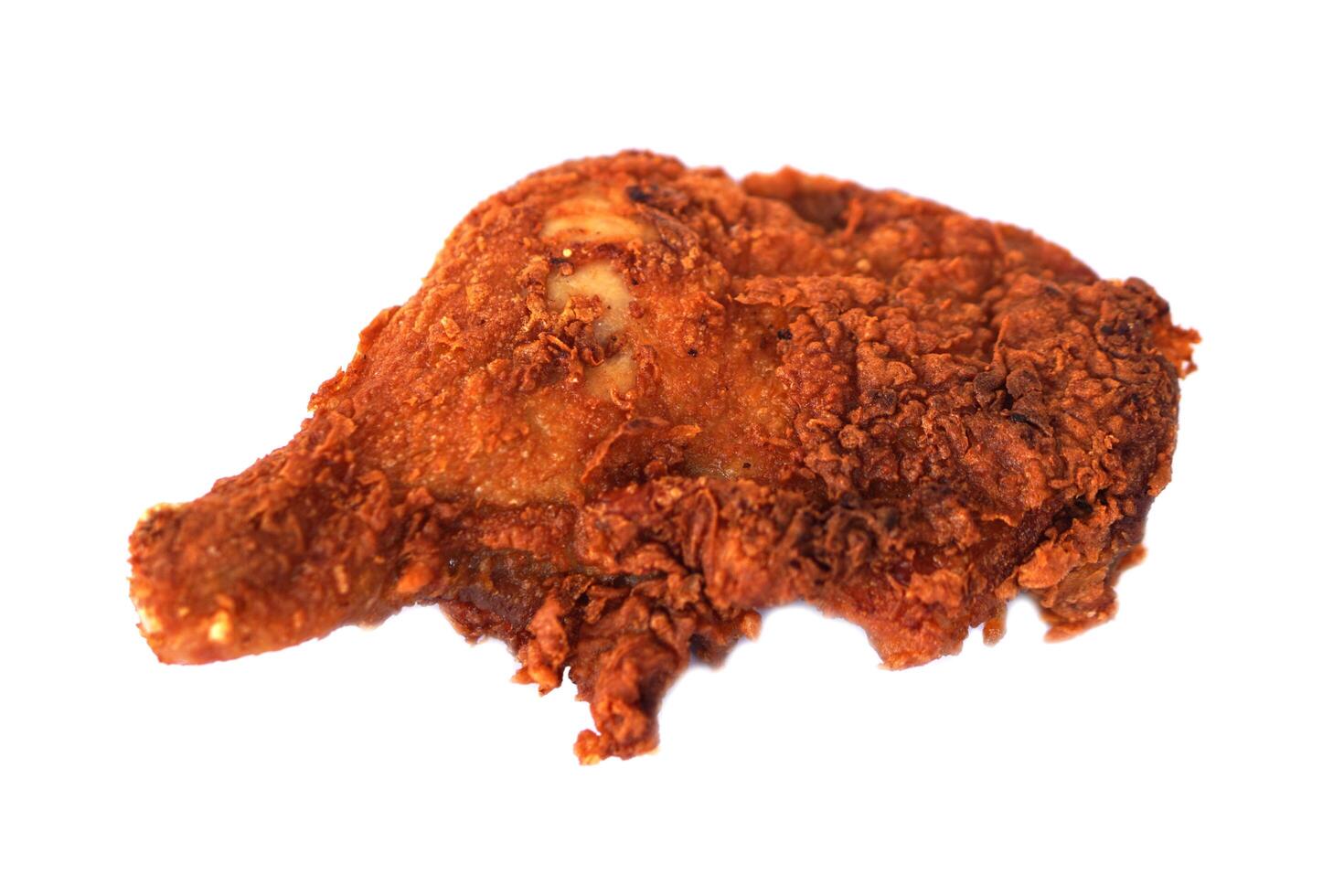 Crispy deep fried chicken leg, isolated on white background. Concept, Favorite delicious food for all. Crispy on outside and tender on inside. Recipe and gourmet. Homemade oily food ,snack or savoury. photo