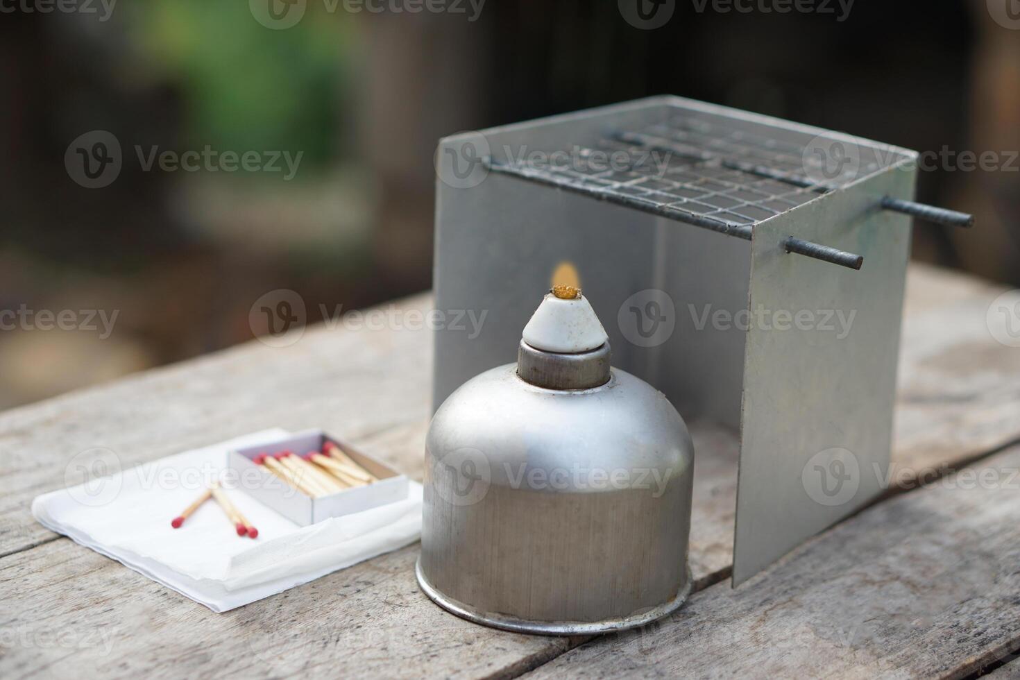 Stainless steel alcohol burner lantern. Laboratory lamp and windshield.Concept, equipment or tool for science experiment. Educational toolkit in science subject. photo