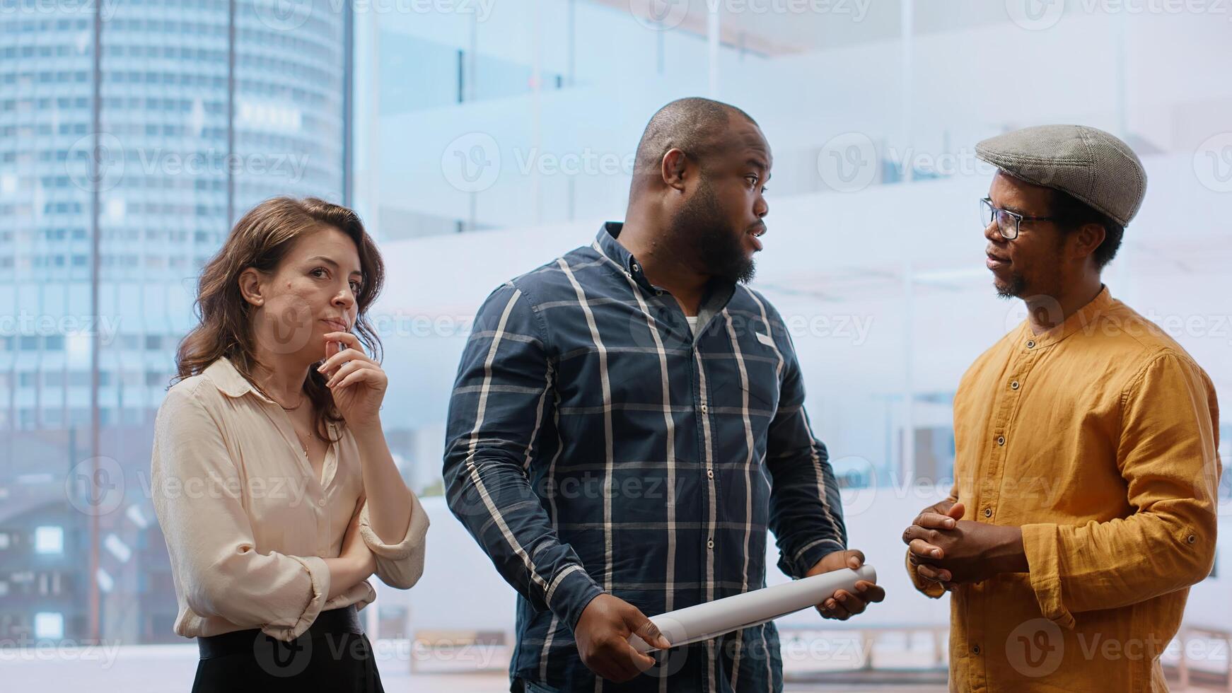 Realtor and business entrepreneur examining blueprints for a high class workspace, rental agreement during an office tour. Client hunting for a new office space, investment planning. Camera B. photo