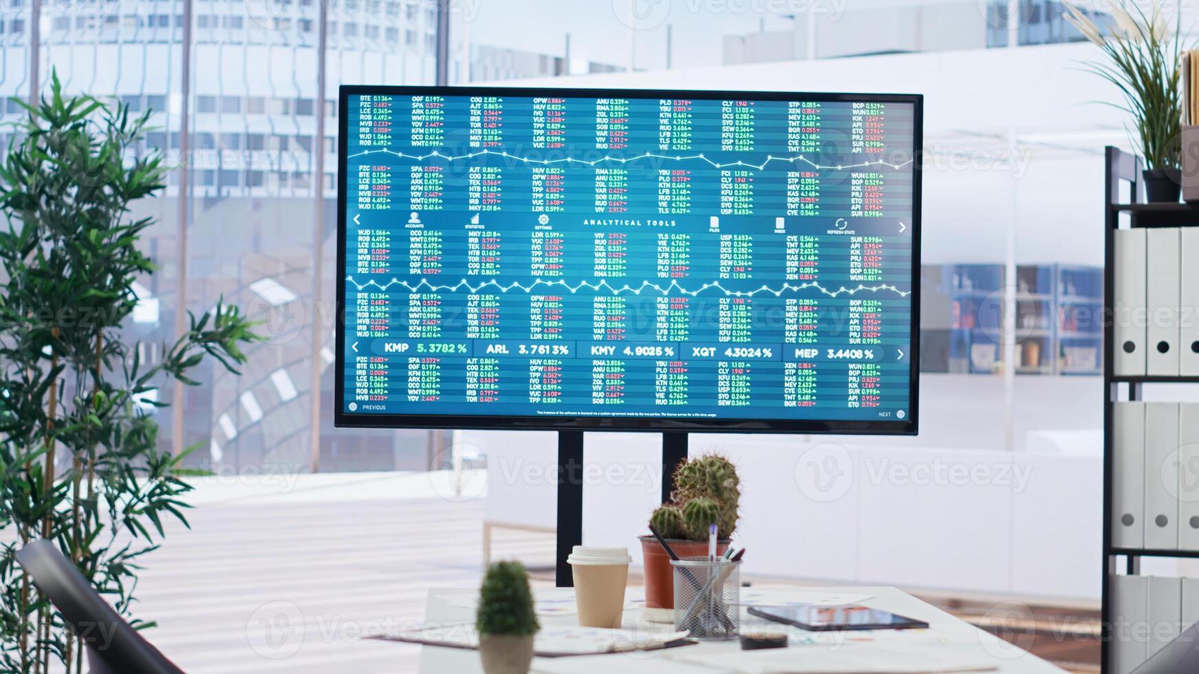 Big screen in financial department office shows stock exchange indices changing in real time. Display in empty workplace with trading indexes showing latest price modifications, camera B photo