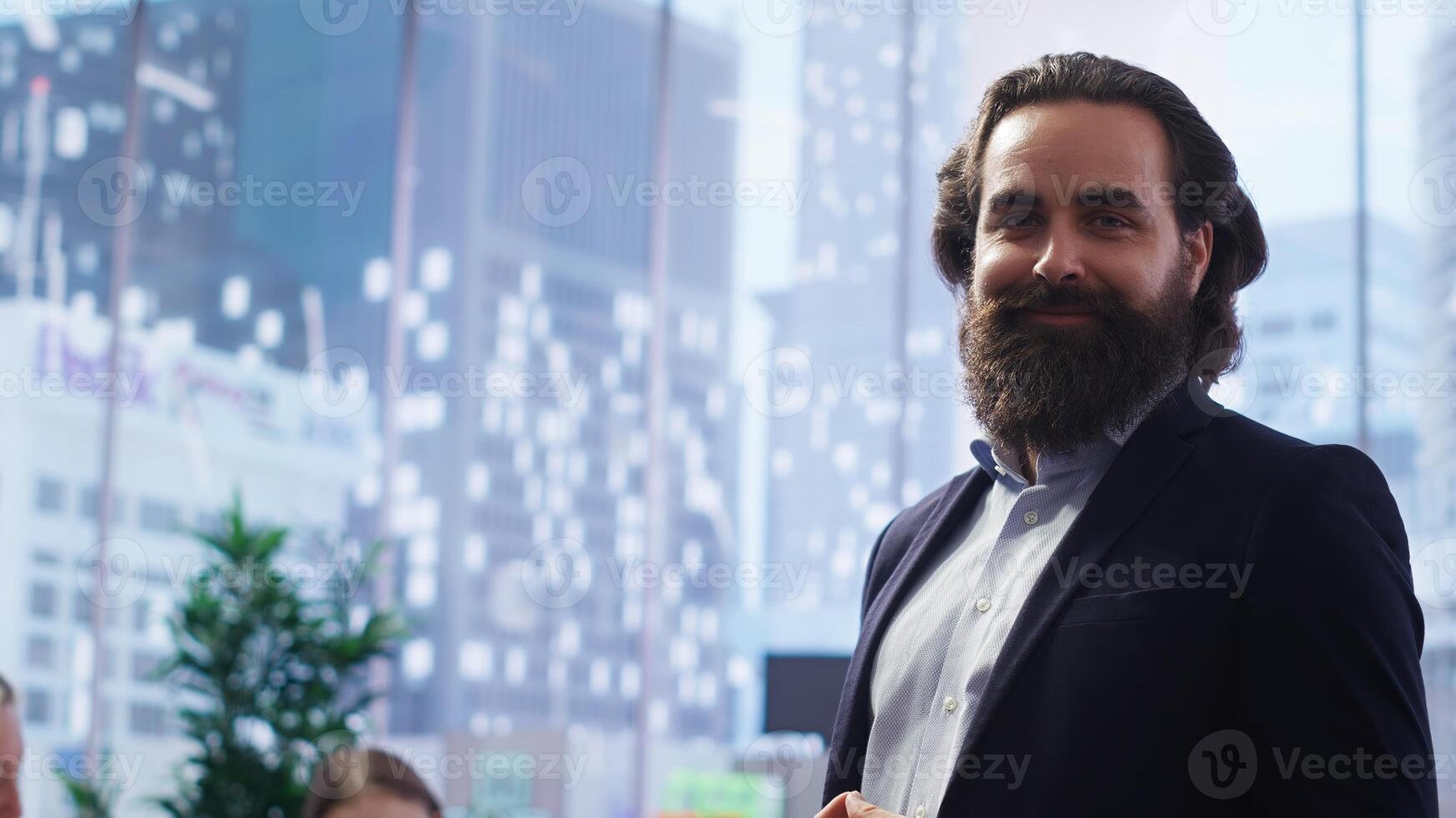 Portrait of happy financial advisor meeting with clients to recommend financial products and investments such as stocks and bonds. Cheerful agent informs family of best investment strategies, camera B photo