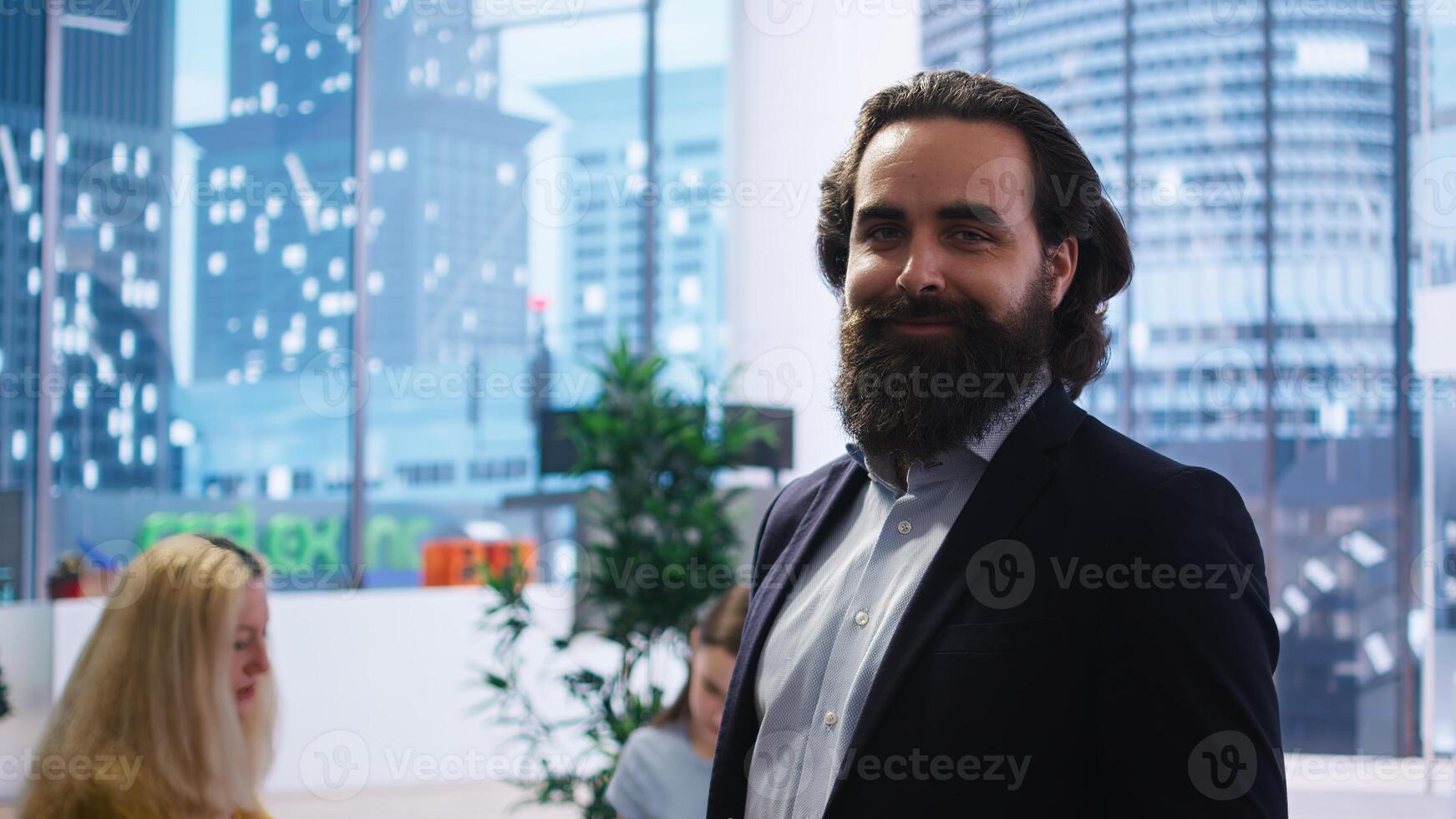Portrait of happy financial advisor meeting with clients to recommend financial products and investments such as stocks and bonds. Cheerful agent informs family of best investment strategies, camera A photo