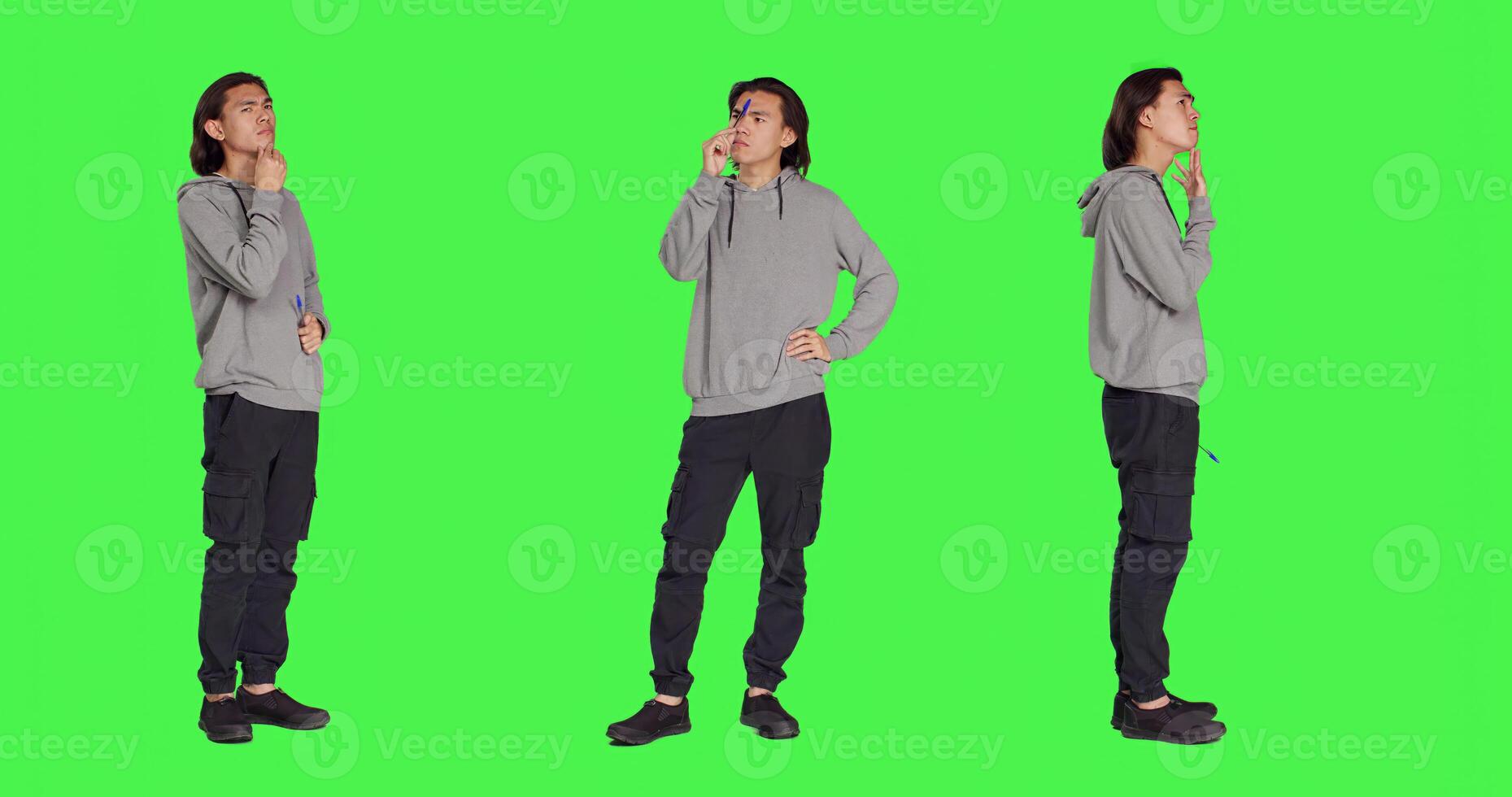 Young thinker acting uncertain on camera, thinking about question and putting his concentration on new perspective. Adult being doubtful and confused, pondering over greenscreen template. photo