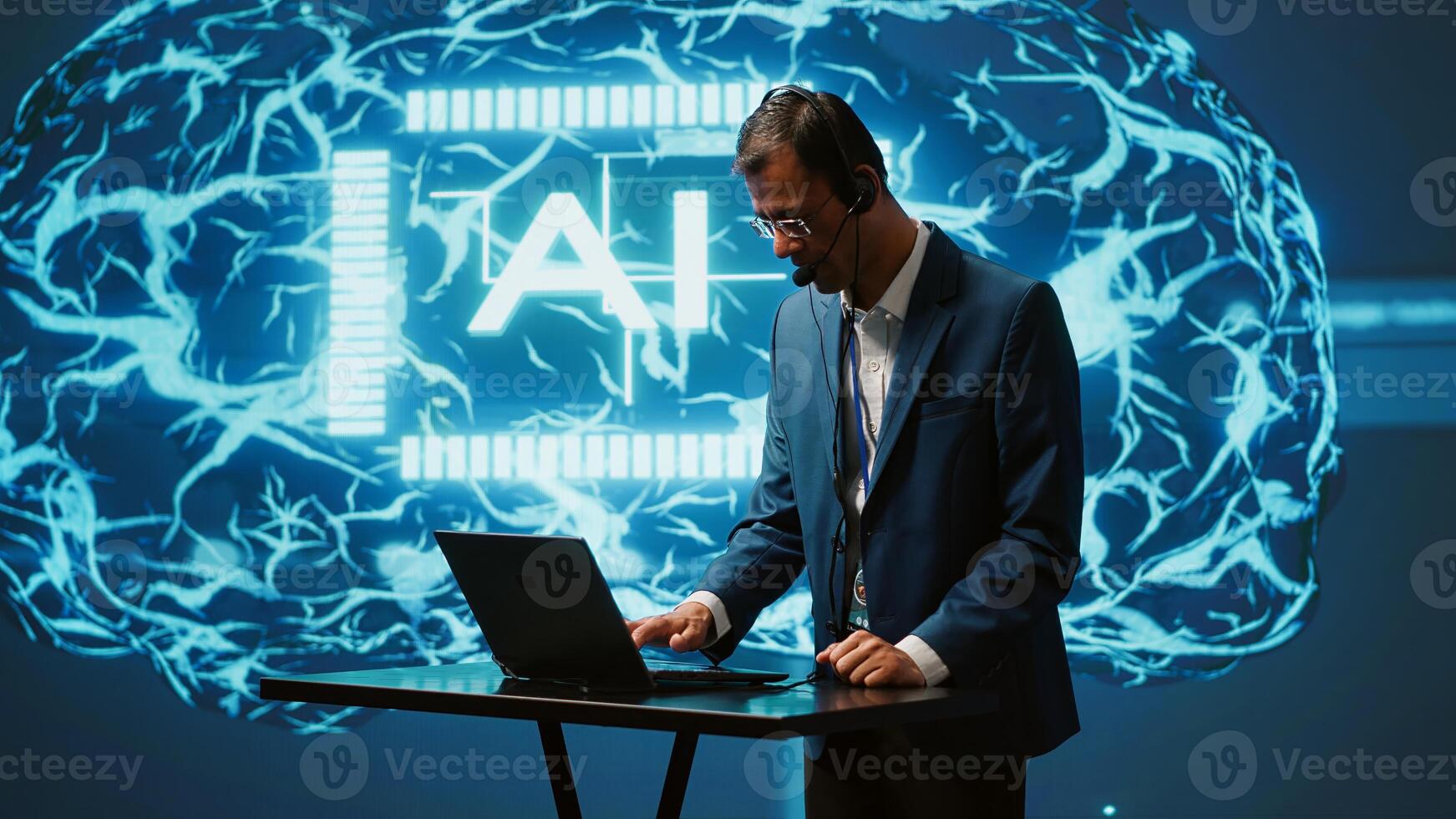 Engineer in artificial intelligence workplace managing call center tasks, speaking into headset. AI company worker chatting with customers through headphones mic, camera A photo