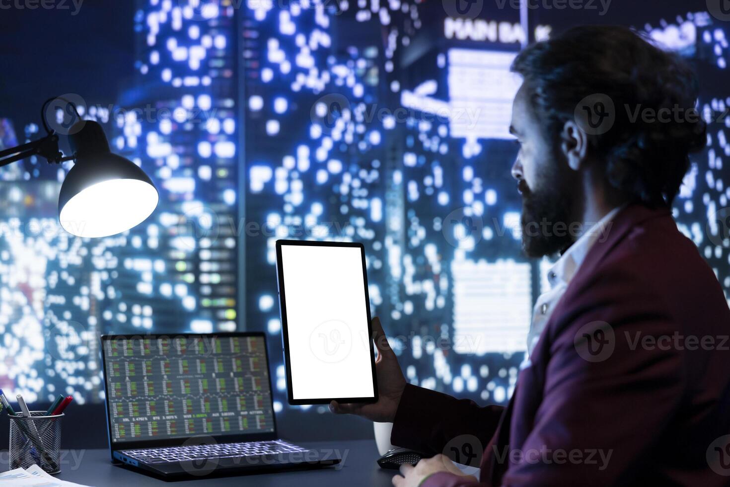 International corporation director holds tablet with white screen, checking trends on stock exchange market to increase business revenue. CEO working with isolated blank display on device. photo