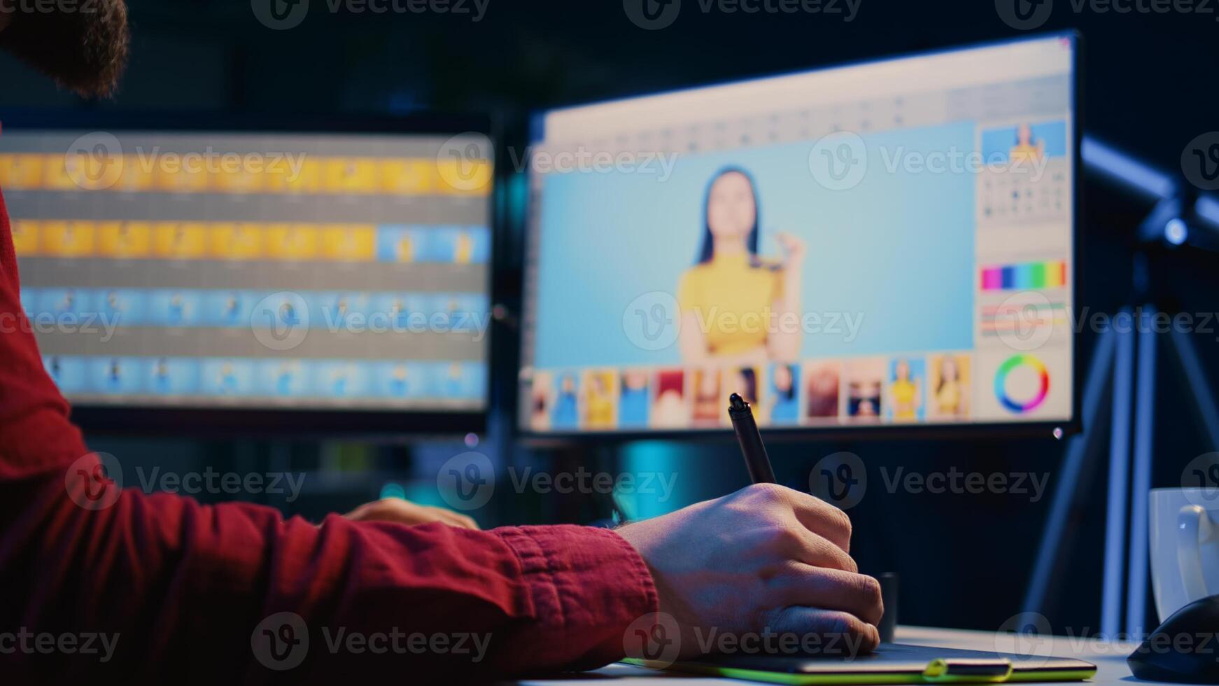 Expert photo editor zooming in on images and fixing faulty spots using graphic tablet in home studio, close up. Professional photographer expertly refining pictures with stylus on touchscreen device