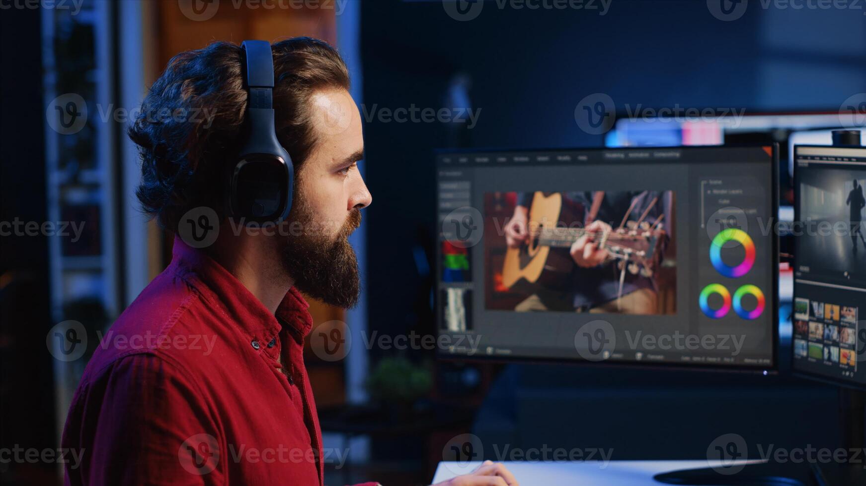editor adds sound effects to filmed footage, working in post production creative studio. Videographer using headphones to test and improve audio quality, editing clips with professional software photo