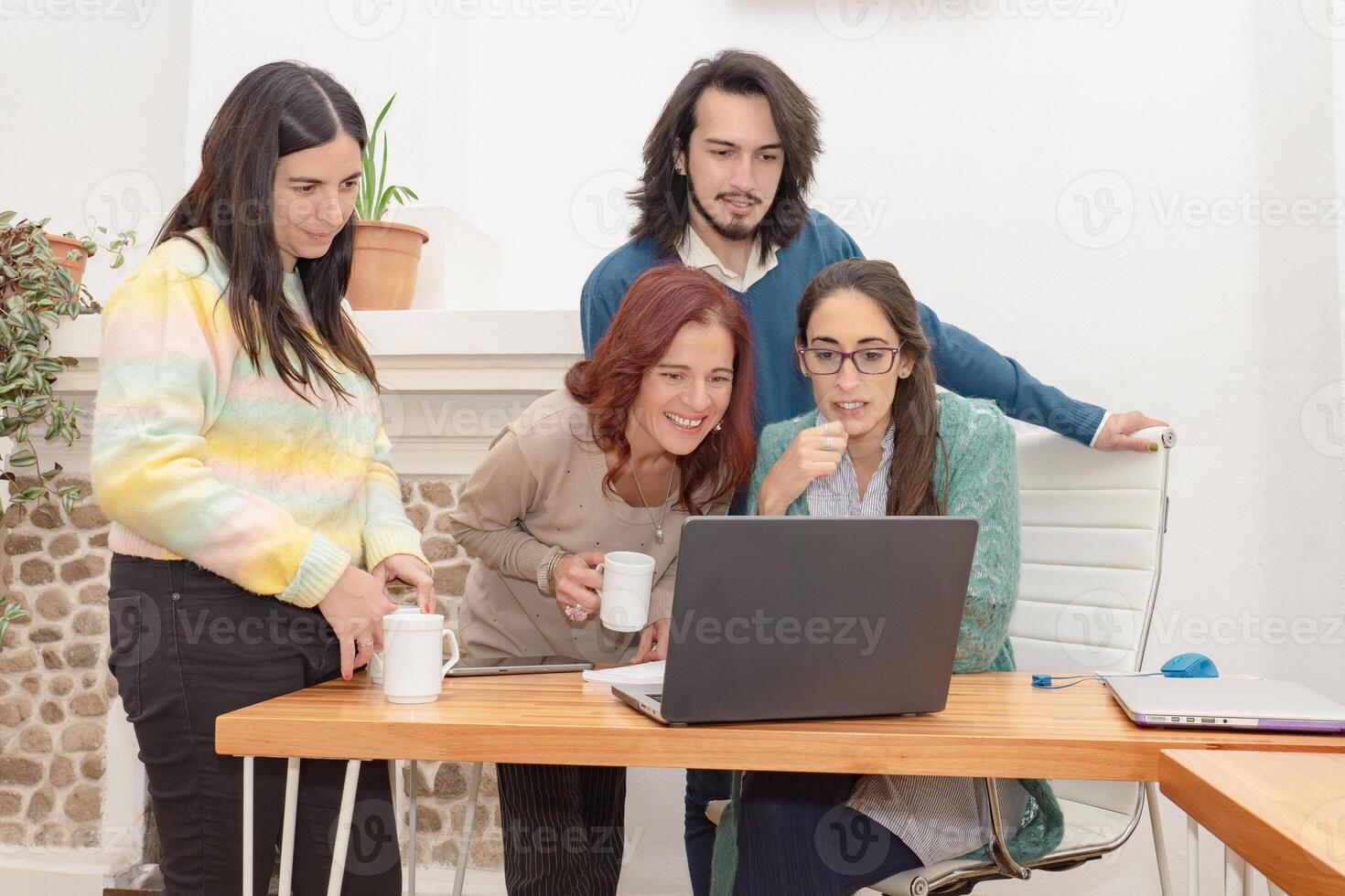 Team of diverse coworkers collaborating in the office. photo