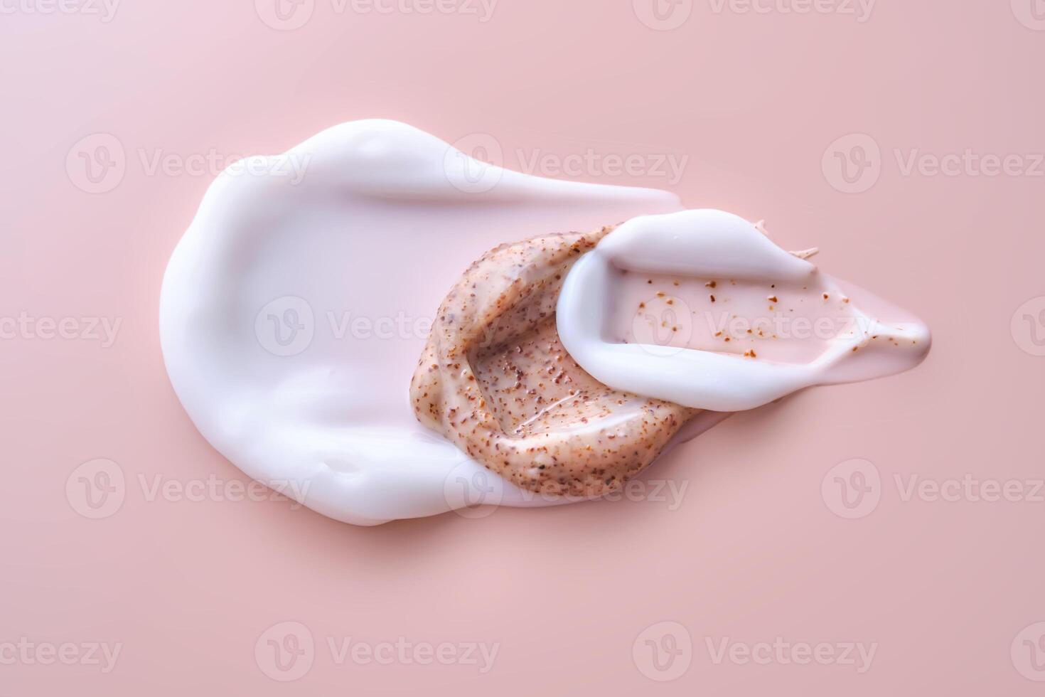 Cream and cream scrub on a pink background. Texture. photo