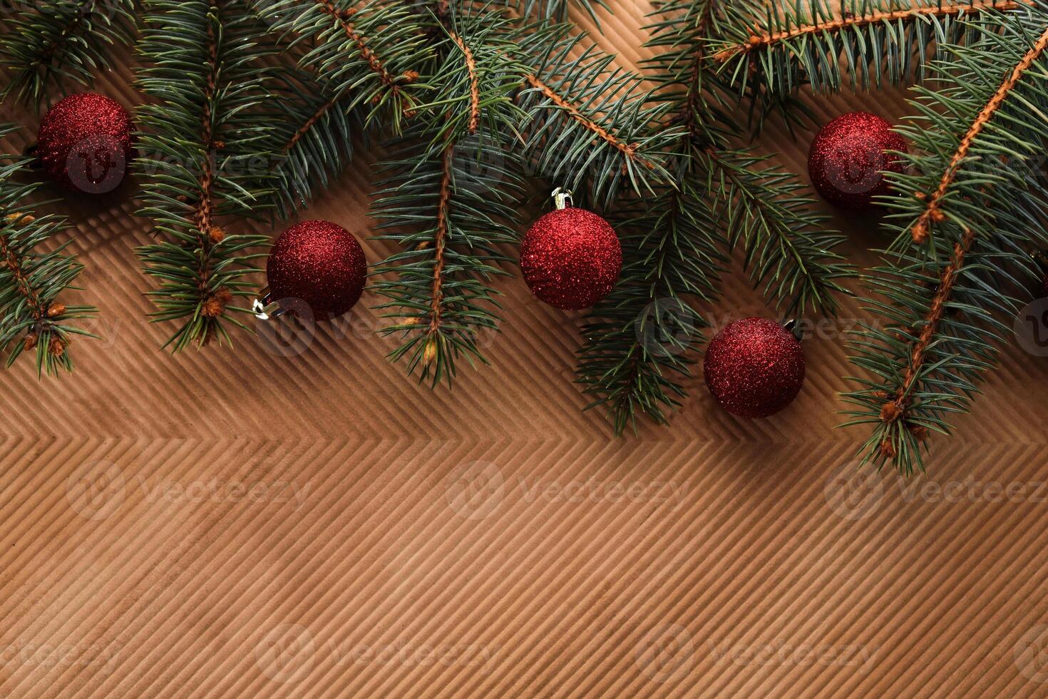 Abstract Christmas and New Year's background with Christmas tree and red Christmas balls. photo