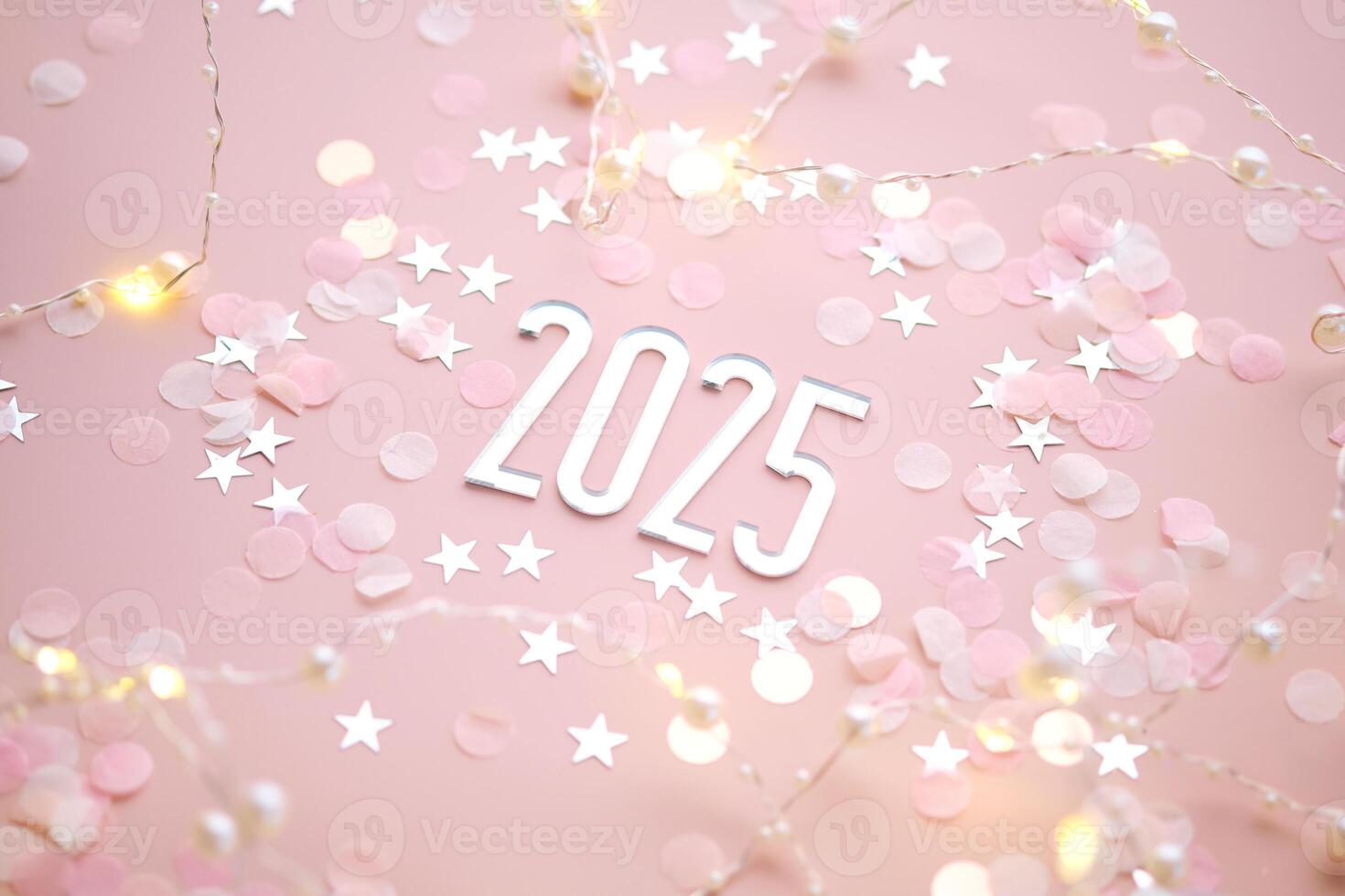 New Year 2025 pink background. Number of the coming year in Christmas decoration. photo