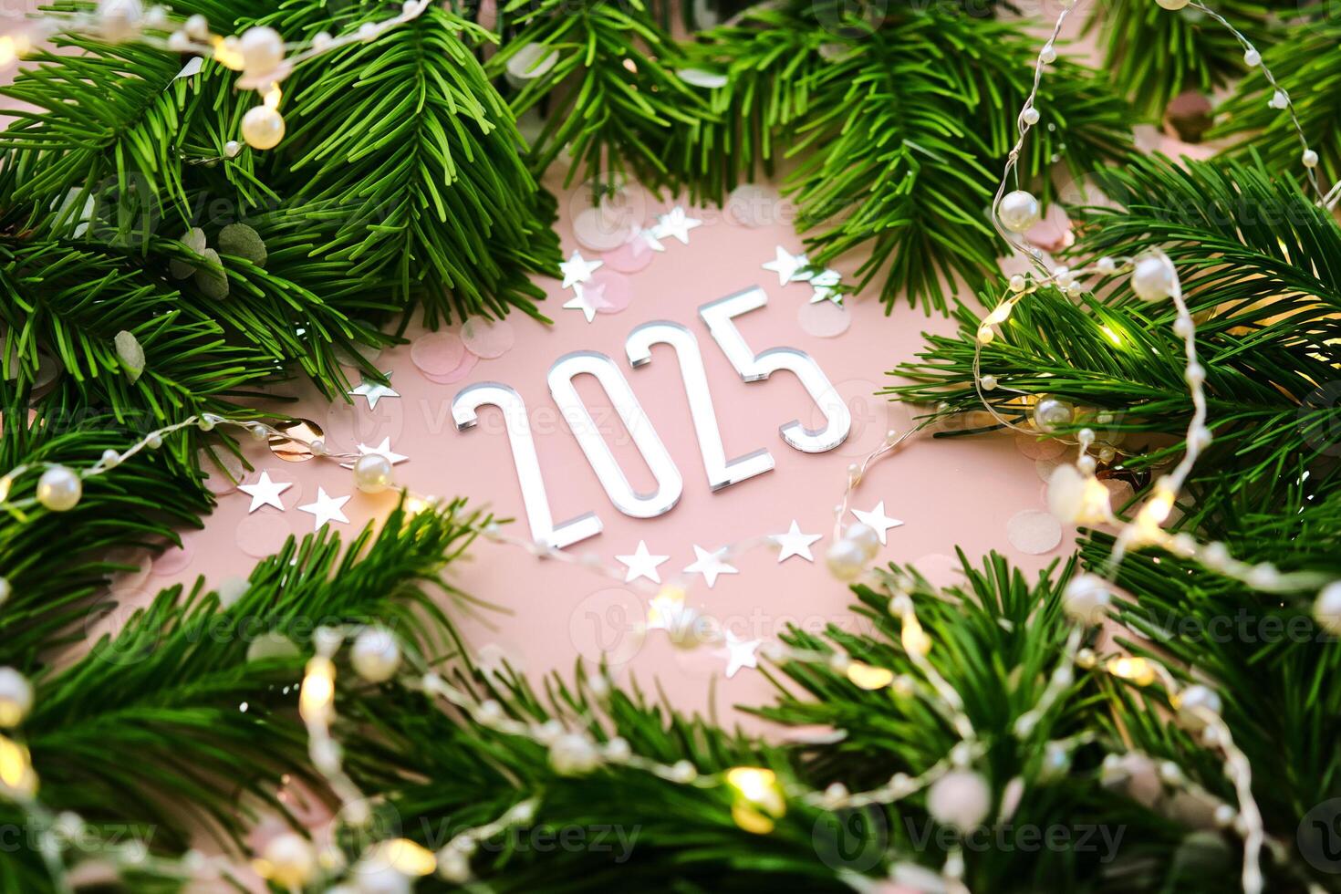 New Year 2025 pink background. Number of the coming year. photo