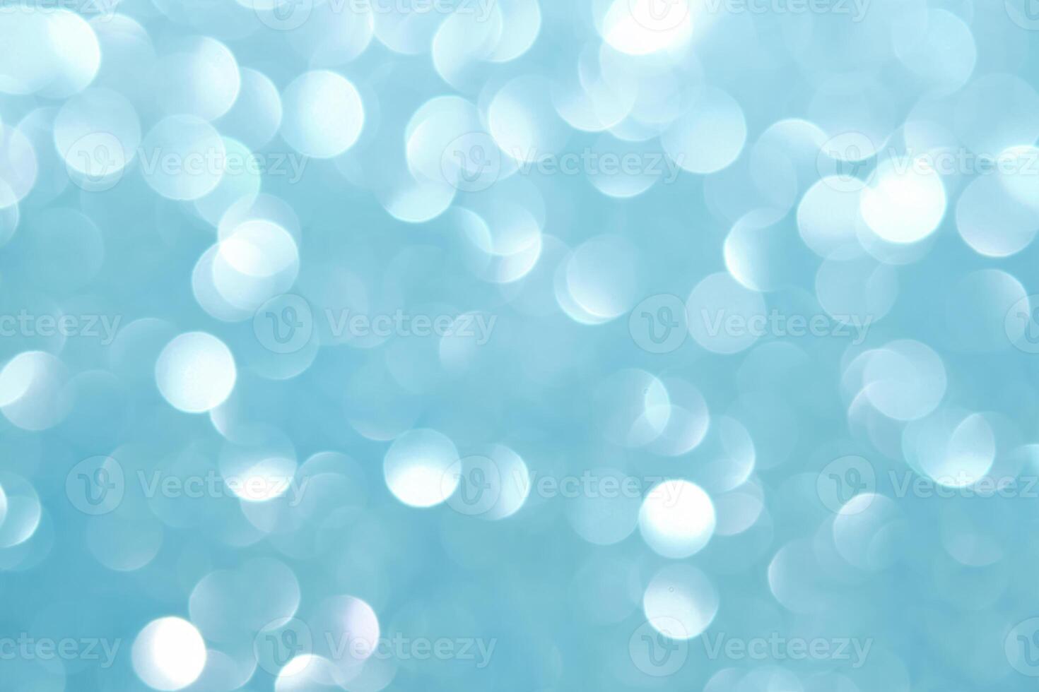 Abstract blue festive christmas background with bokeh. photo