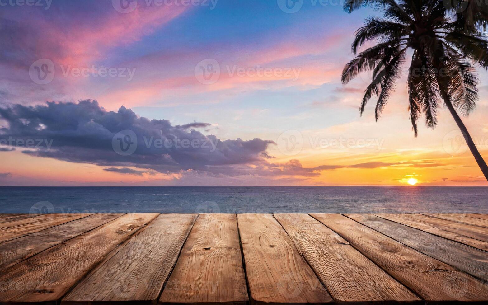 wooden empty table at sunset with ocean view photo