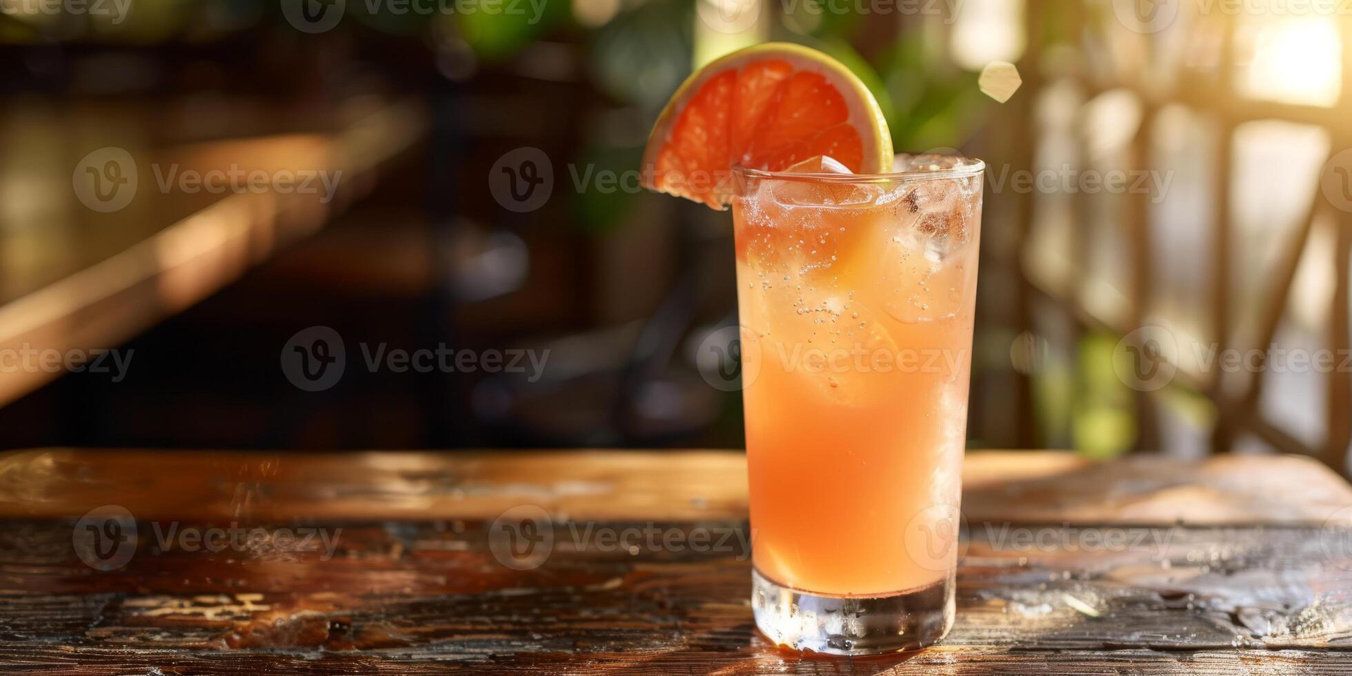 Immerse yourself in a nostalgic ambiance at a retro bar, savoring a refreshing citrus cocktail in a classic setting with a cozy and welcoming atmosphere, perfect for a relaxed night out photo